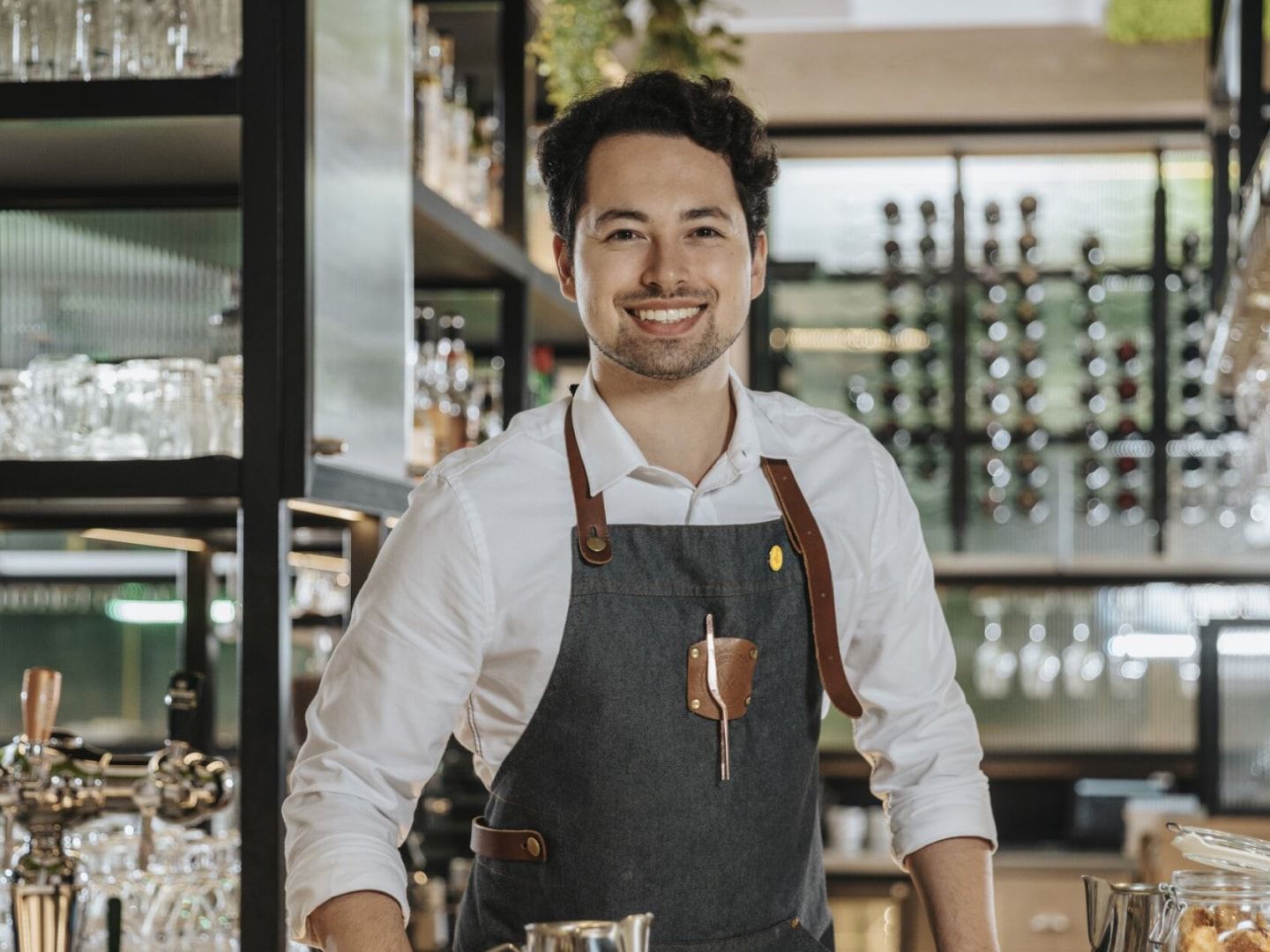 Friendly bartender at a voco bar