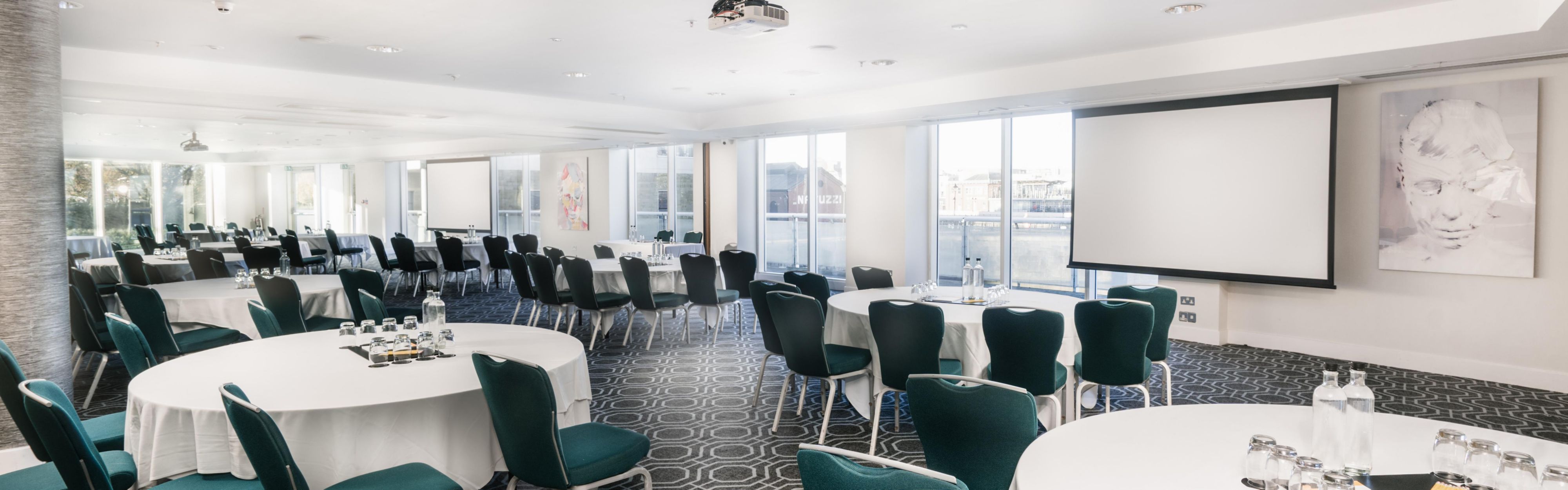 Large conference room with projector screen