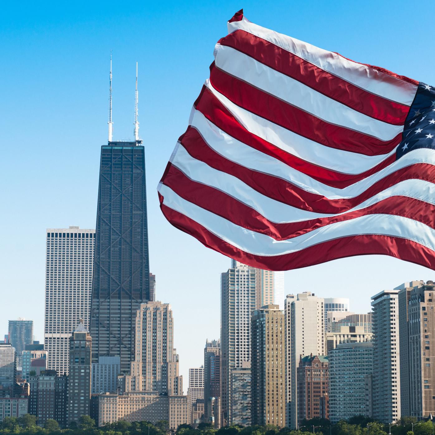 American Flag and view of downtown Chicago