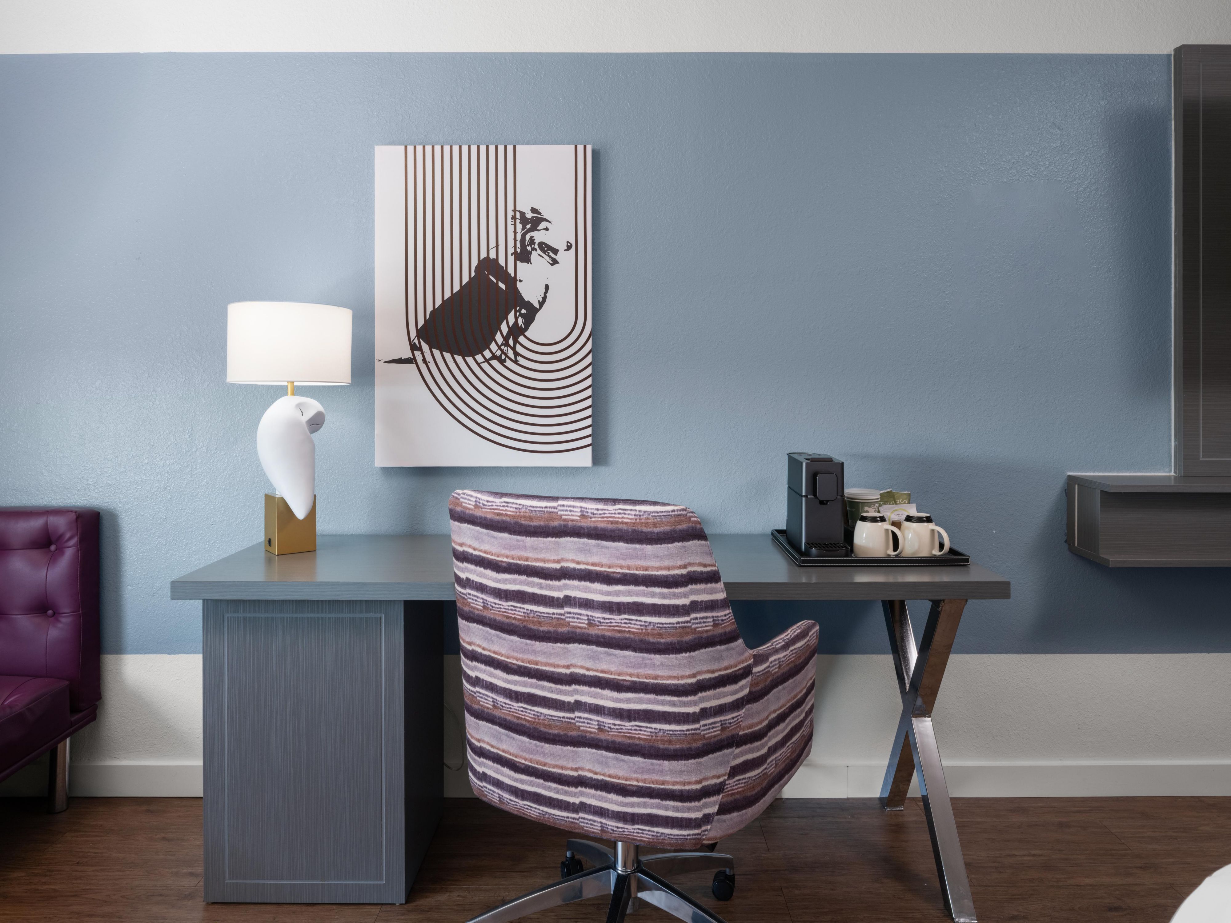 Desk with chair and ceramic mugs