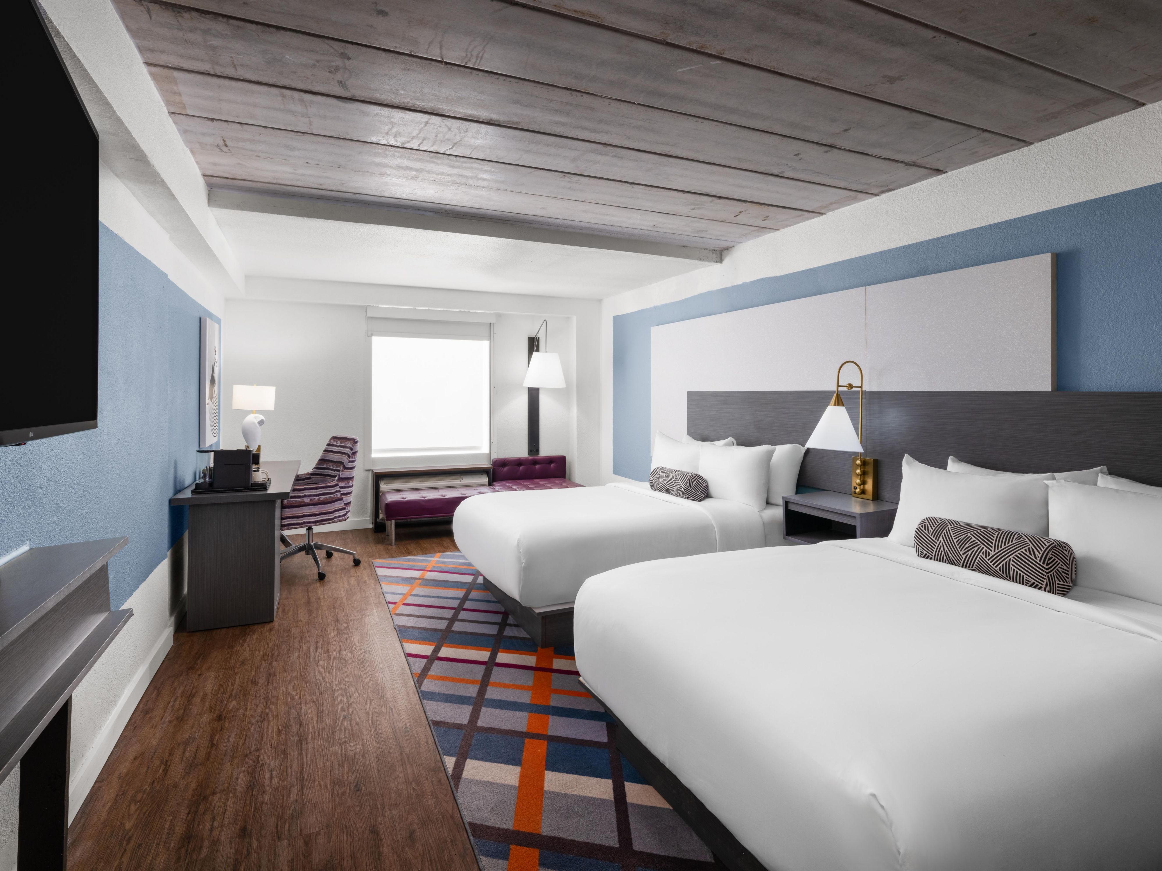 Relax in a modern double-queen room in College Station