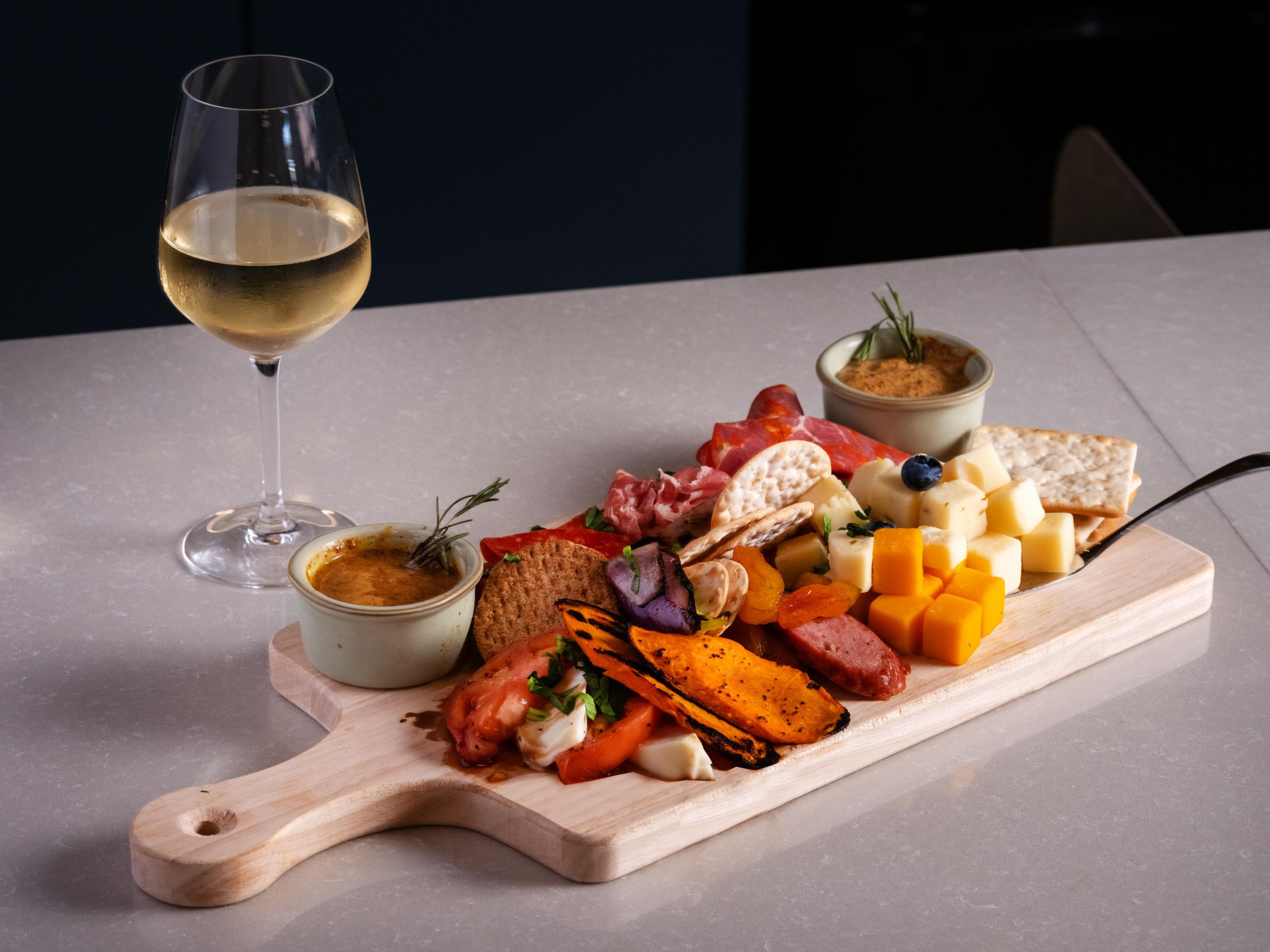 Savor wine and charcuterie at voco College Station near campus
