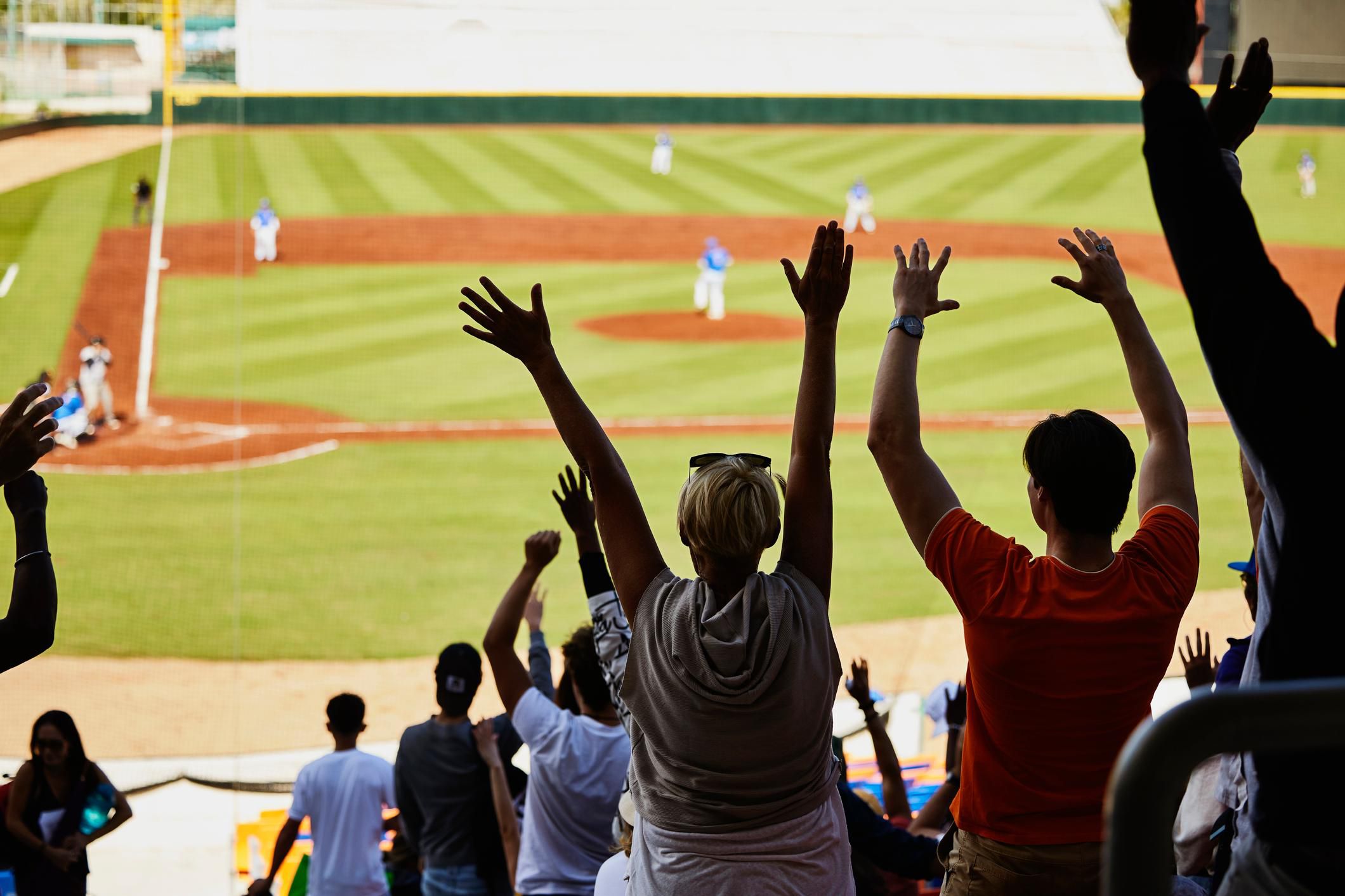Baseball fans cheering 