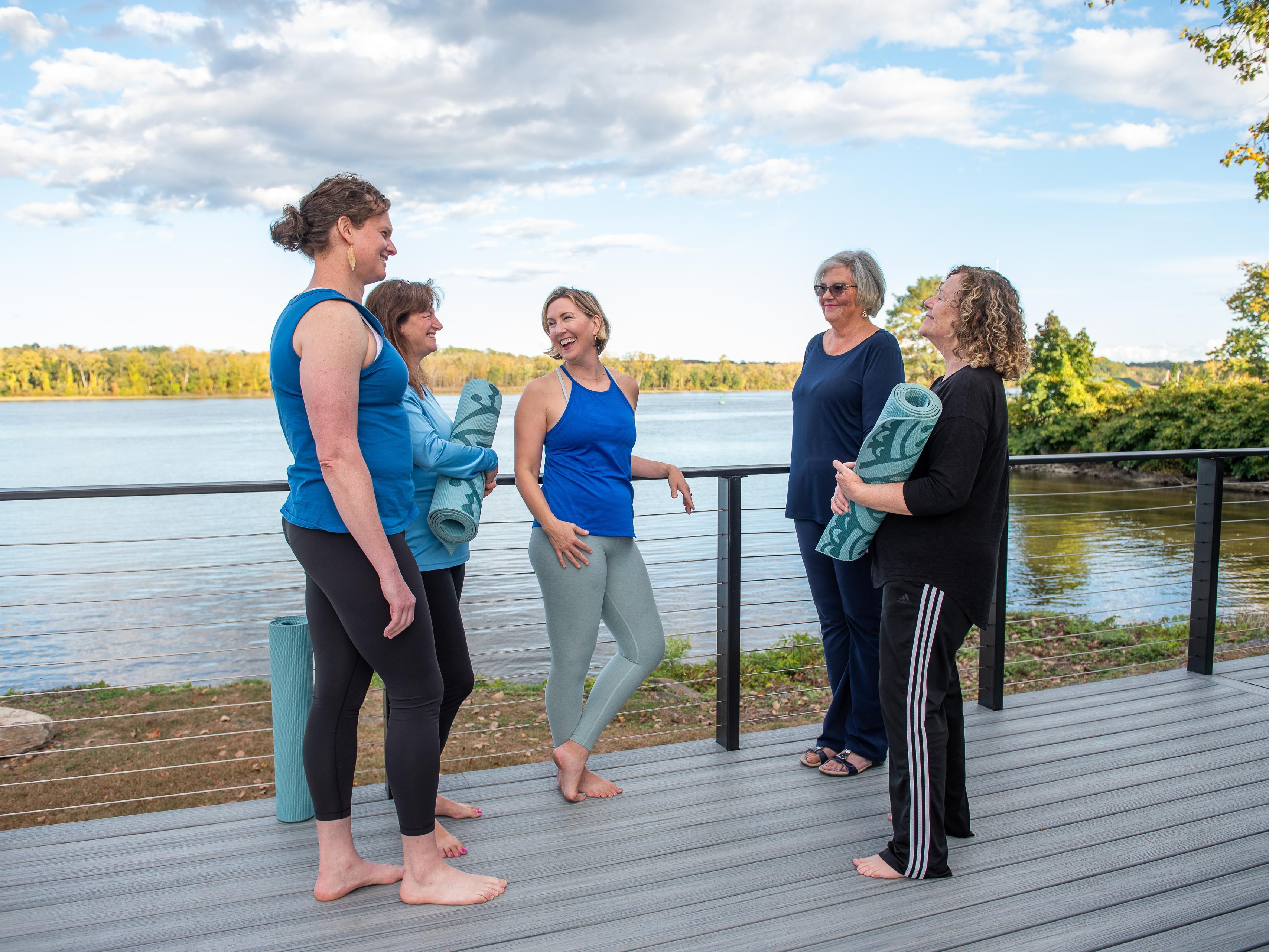 Yoga group talking outside