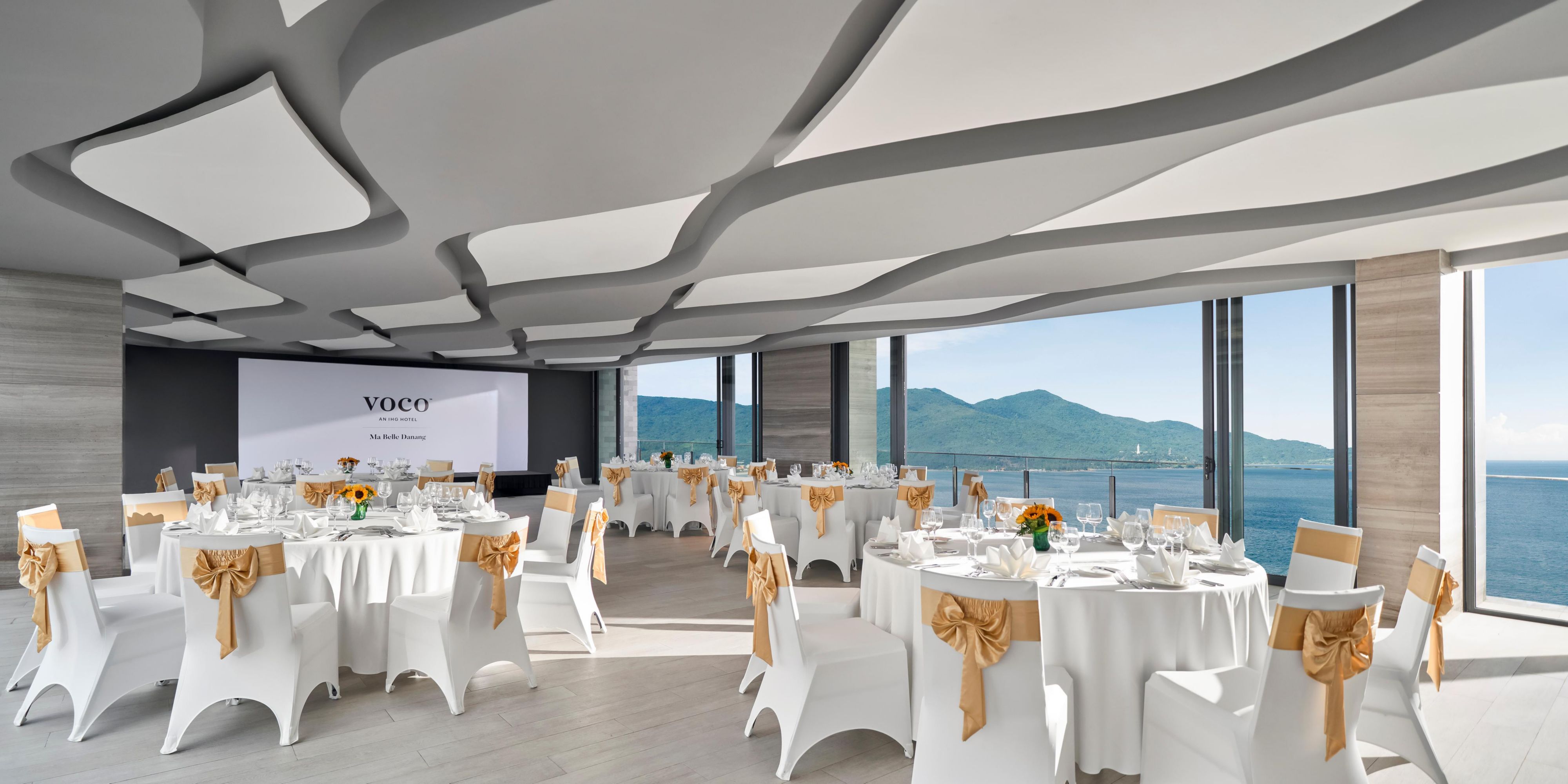 Embrace the wow factor in our Ma Belle Ballroom, perfect for weddings, galas, and conferences, while our 2 meeting rooms are ideal for smaller events. Natural light makes the space feel warm and welcoming. With state-of-the-art equipment and technology, we're ready to bring your vision to life.
