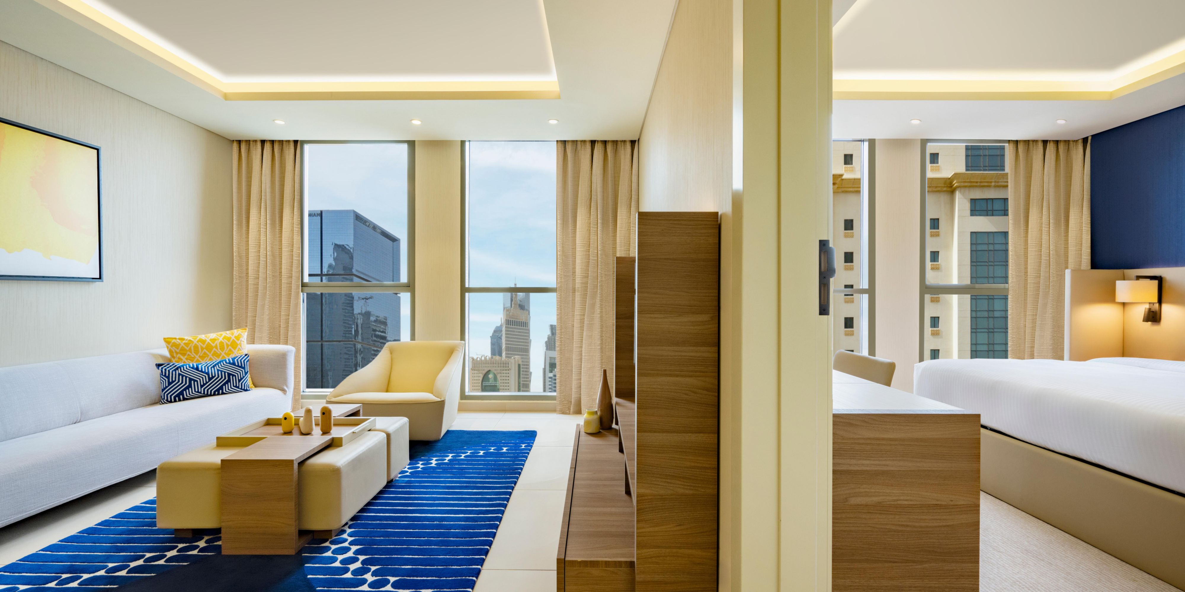 Experience the dynamic energy of West Bay while staying in our unstuffy suites in Doha, designed for both short and long stays. With charming interiors and the signature voco flair, our welcoming suites are your home away from home in the heart of Qatar’s capital city. Marvel at magnificent sunset views from the floor-to-ceiling windows.