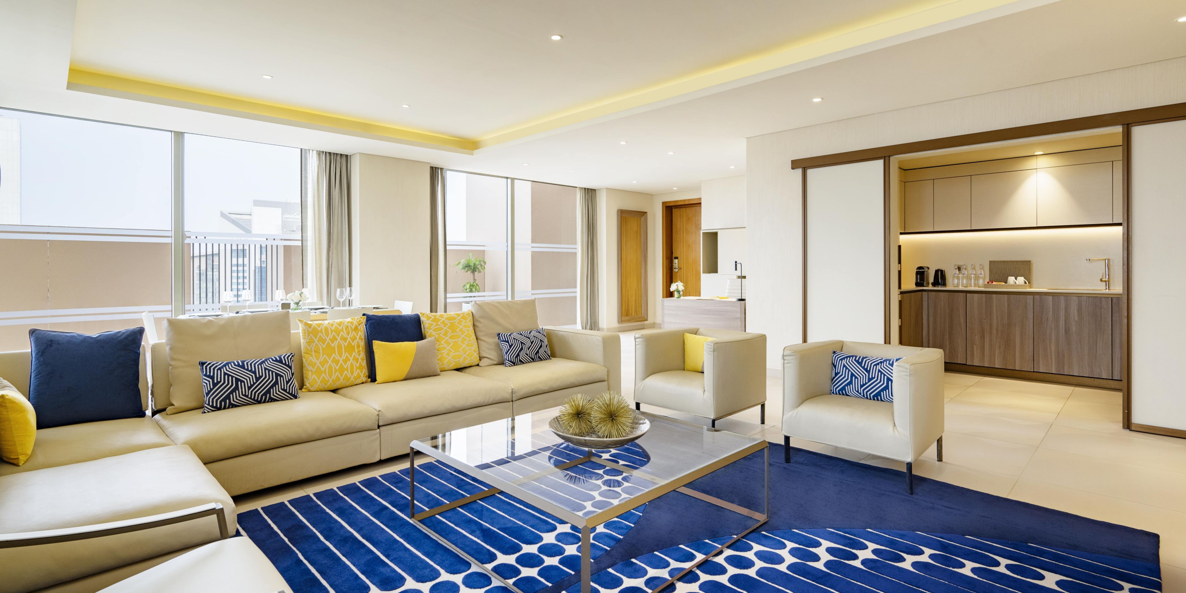 Step into our penthouses, among the most exclusive suites in Doha, featuring expansive living spaces and panoramic views. Elegantly designed, each penthouse includes a spacious living room, dining area, fully equipped kitchen, and three bedrooms. Pamper yourself in luxurious bathrooms, outfitted with bathtubs and rain showers.