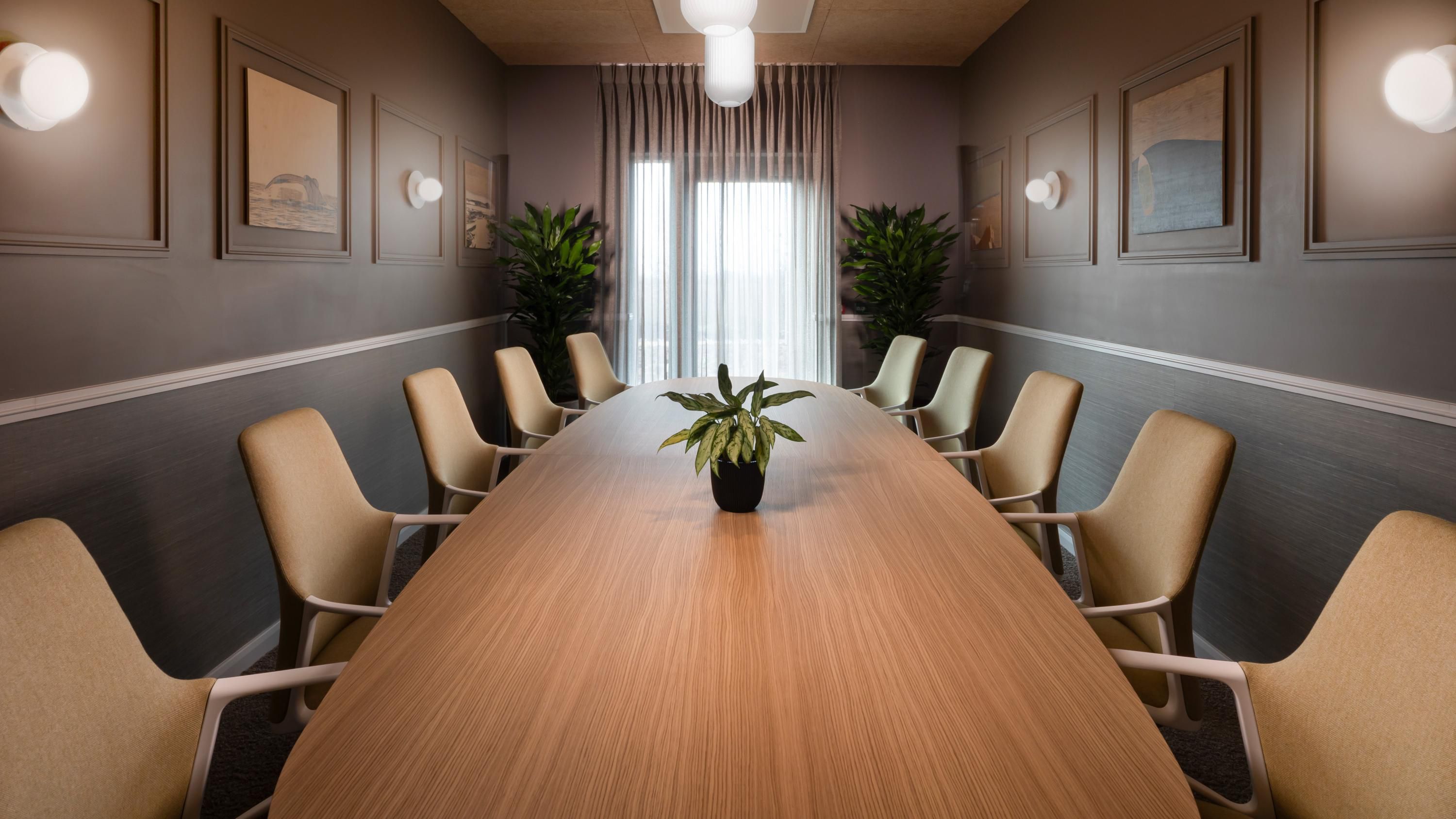 Modern table for 10 delegates, with floor to ceiling windows 