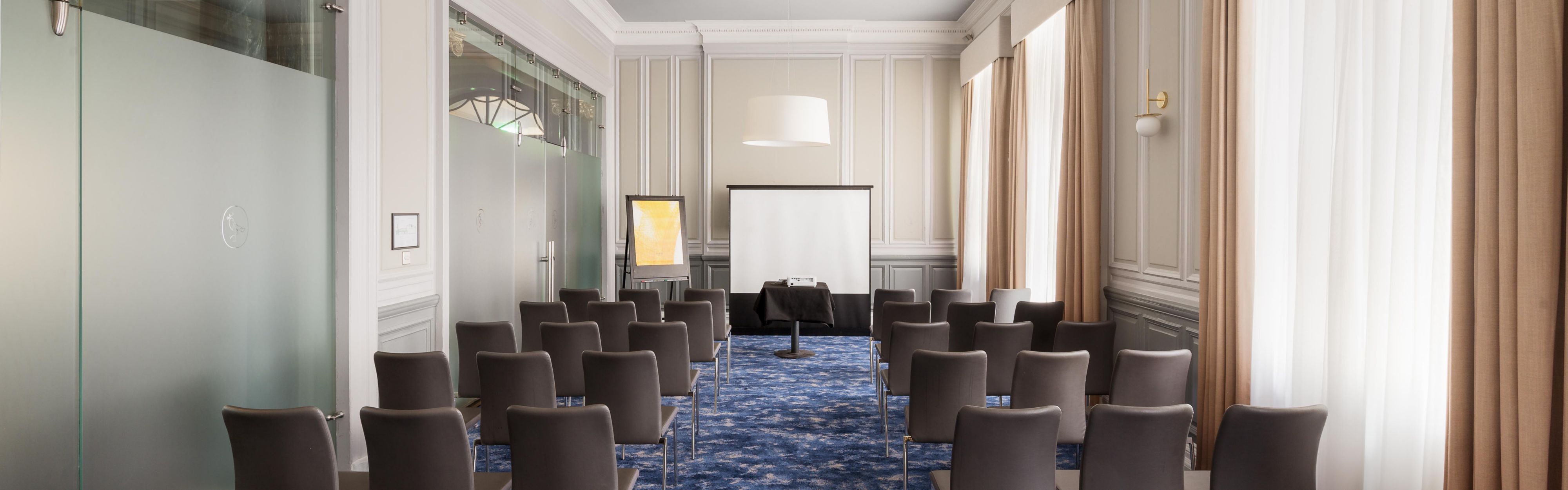 Large conference room with projector screen