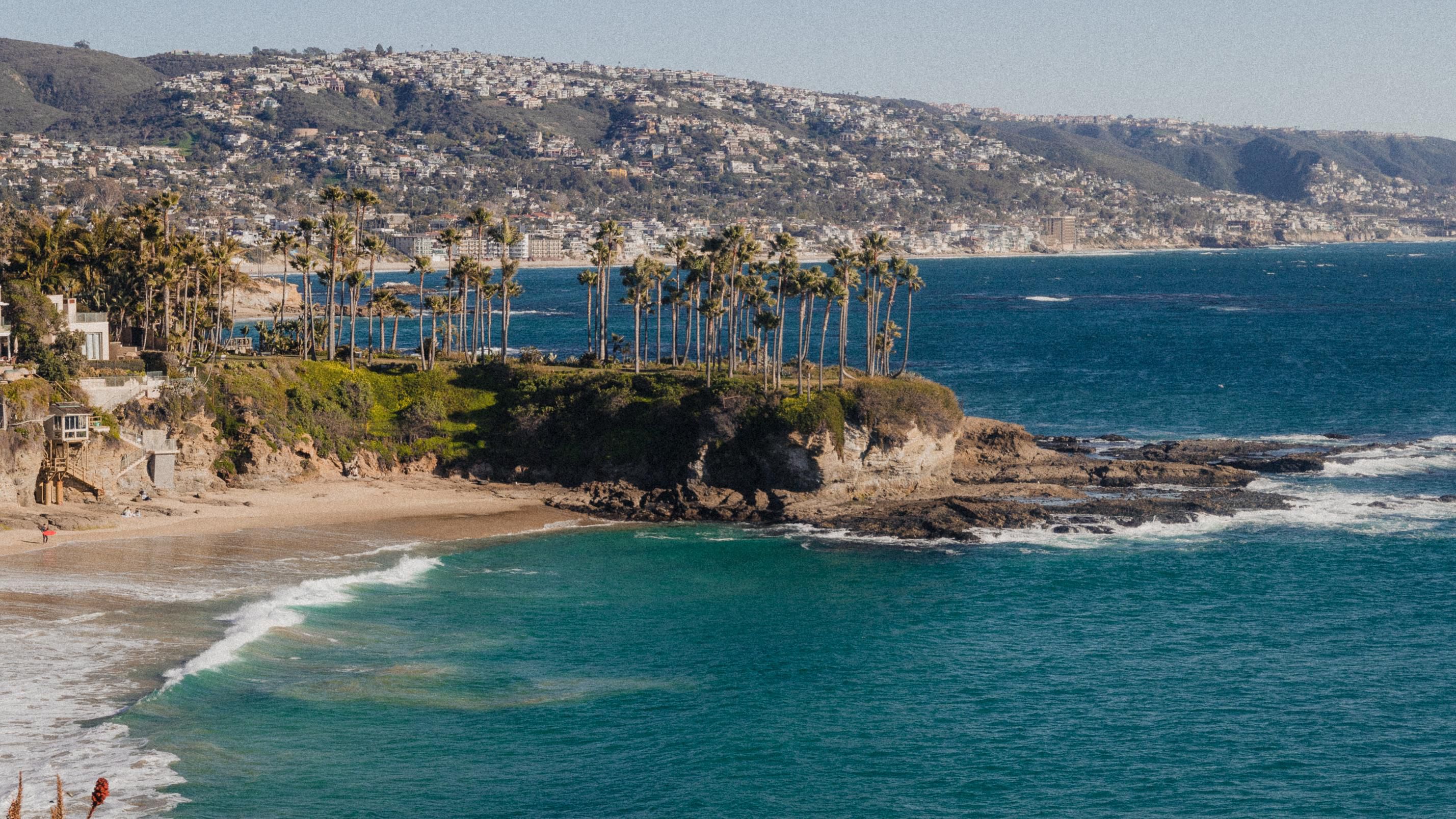 Scenic view of Crescent Bay Point Park with ocean backdrop.