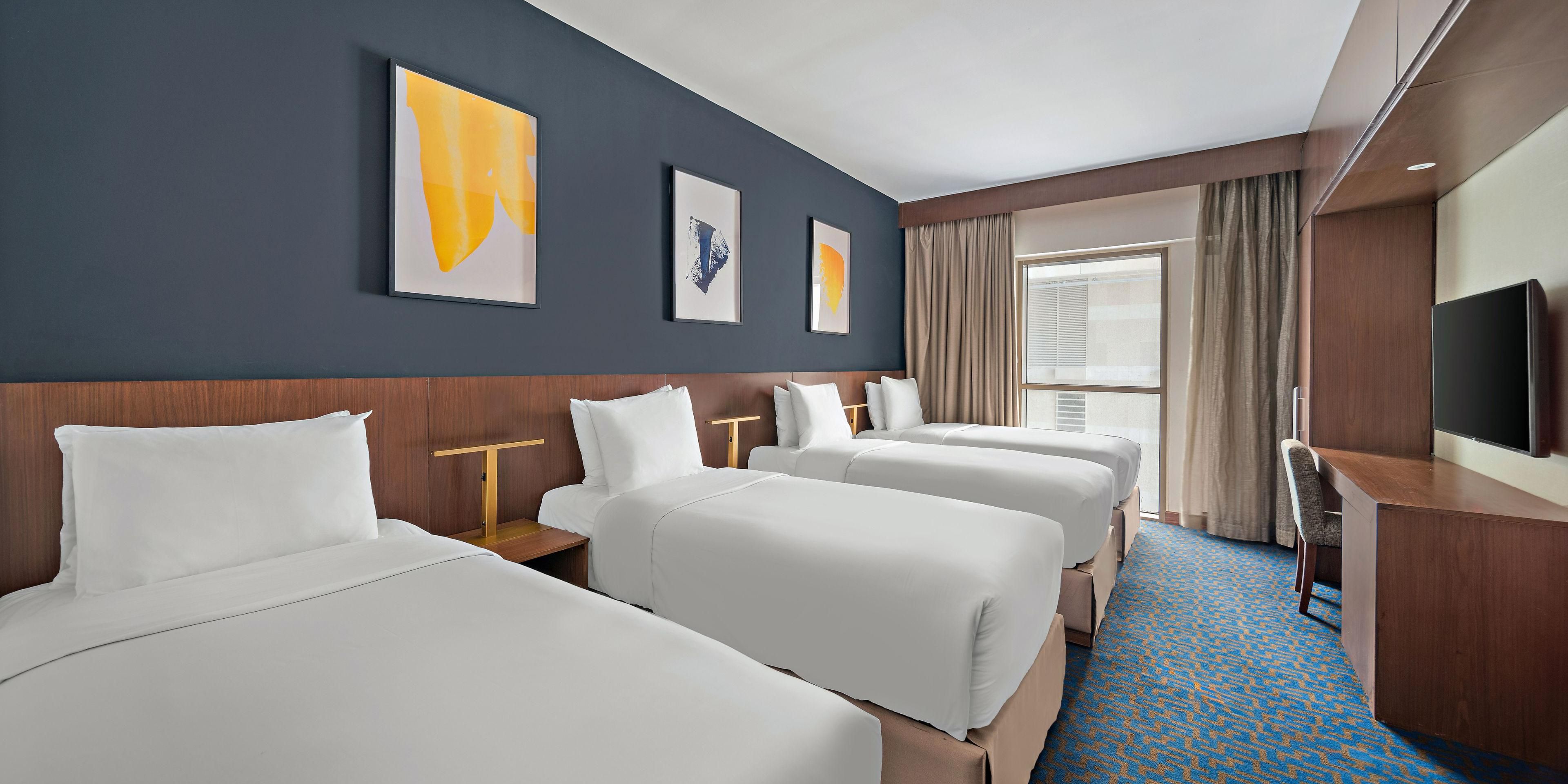 At voco Makkah, we know that a comfortable stay is key when you're exploring new horizons with your loved ones. Our Family Rooms come with a personalised wardrobe to keep your things organized, a cosy living area to kick back and unwind, and generous bathroom facilities to ensure everyone has plenty of space to get ready in the morning.