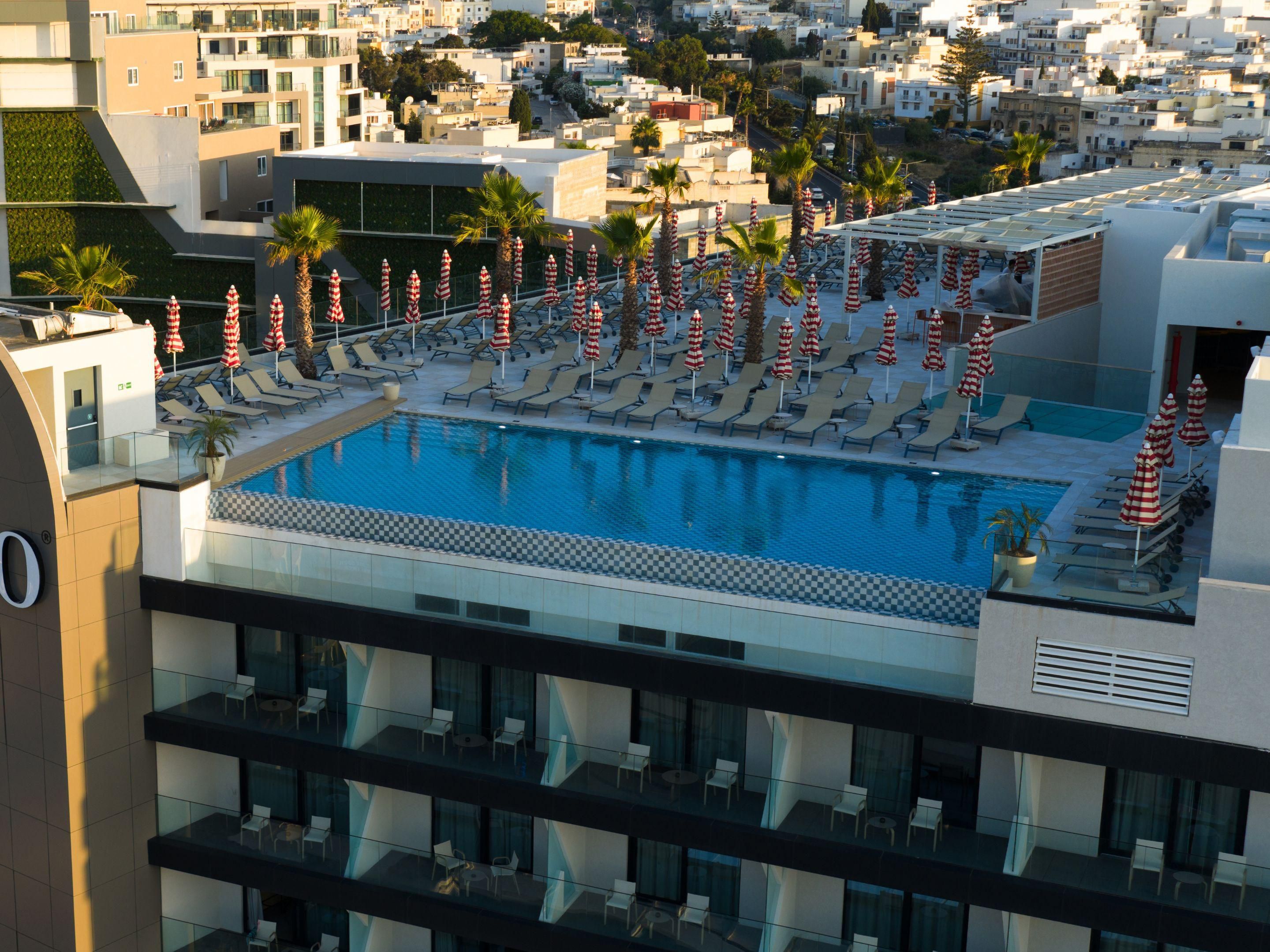 Skyline swims and sunset sips at Volare, only at voco Malta.
