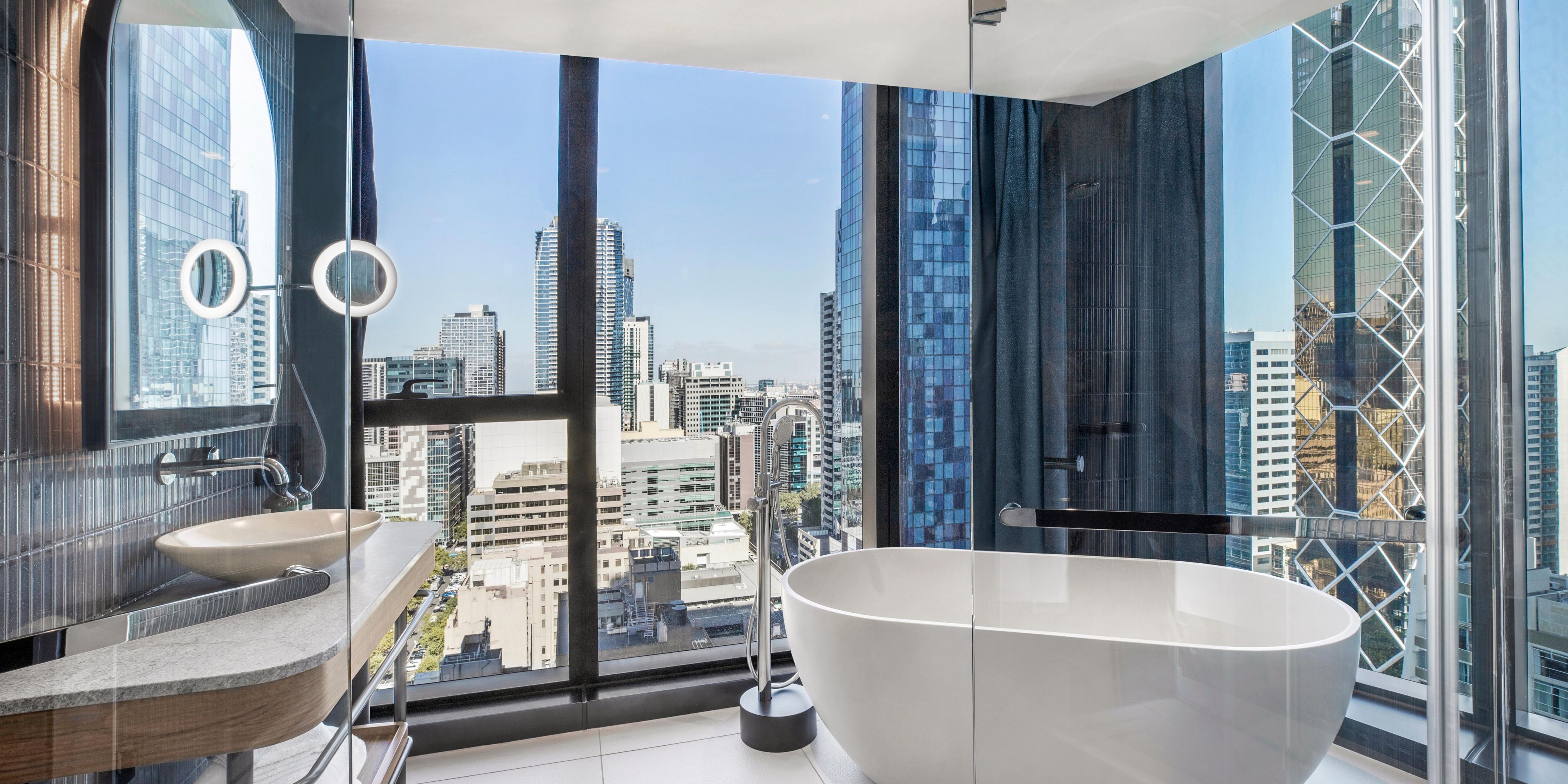 Indulge in some much needed 'me time' in our high floor bathtub room. Enjoy 180-degree views of the city from above while you cocoon yourself in luxurious bubbles.