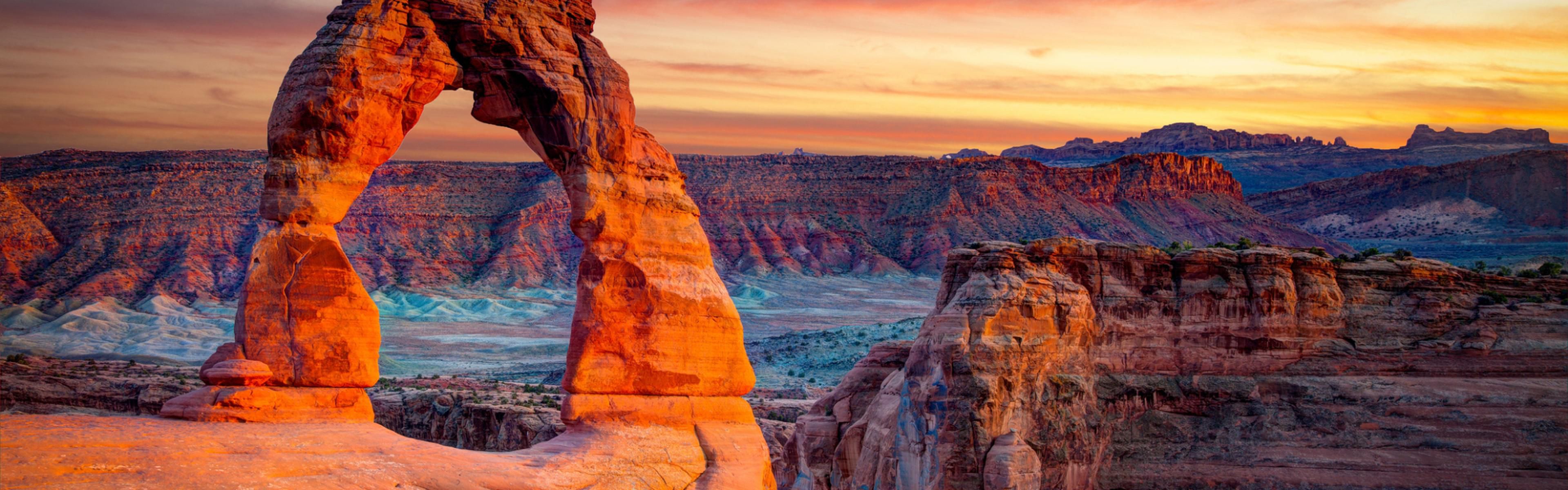 Sunrise at Delicate Arch in Arches National Park.