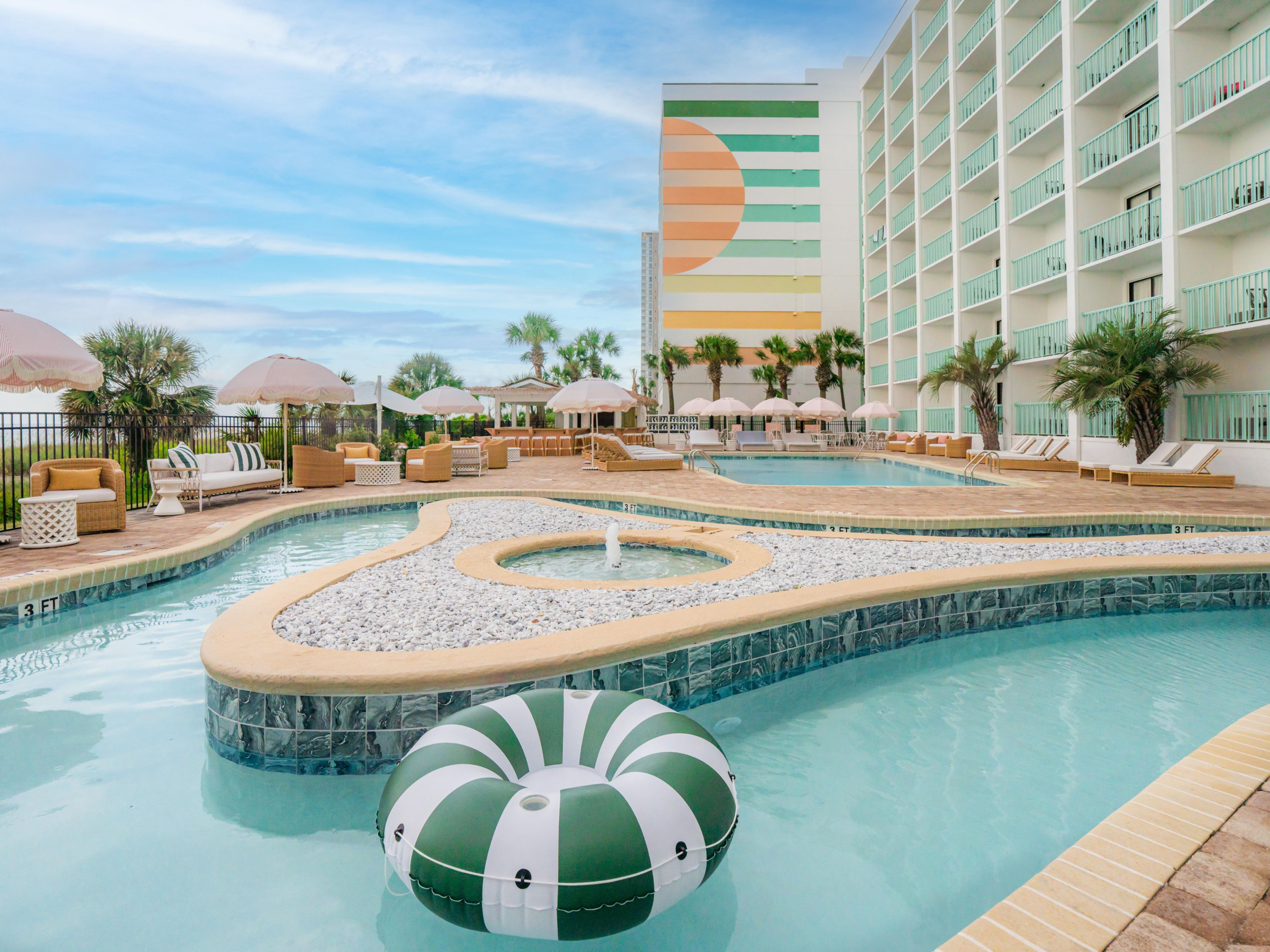 Dive into retro beach vibes at our oceanfront pool and lazy river. Whether you’re floating in the lazy river, sipping a frozen cocktail, or cooling off in the shade, this is your front-row seat to pure relaxation.