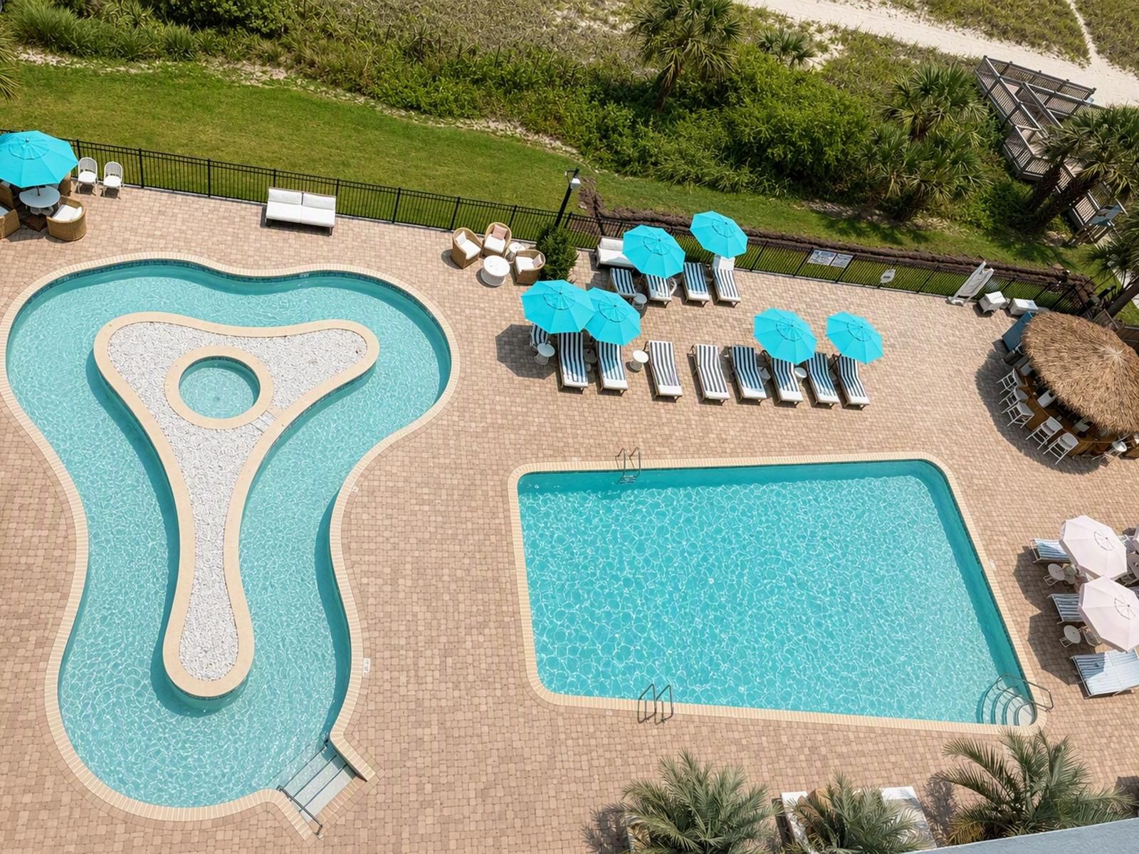 Enjoy the day at the pool or lazy river at voco The Shelby.