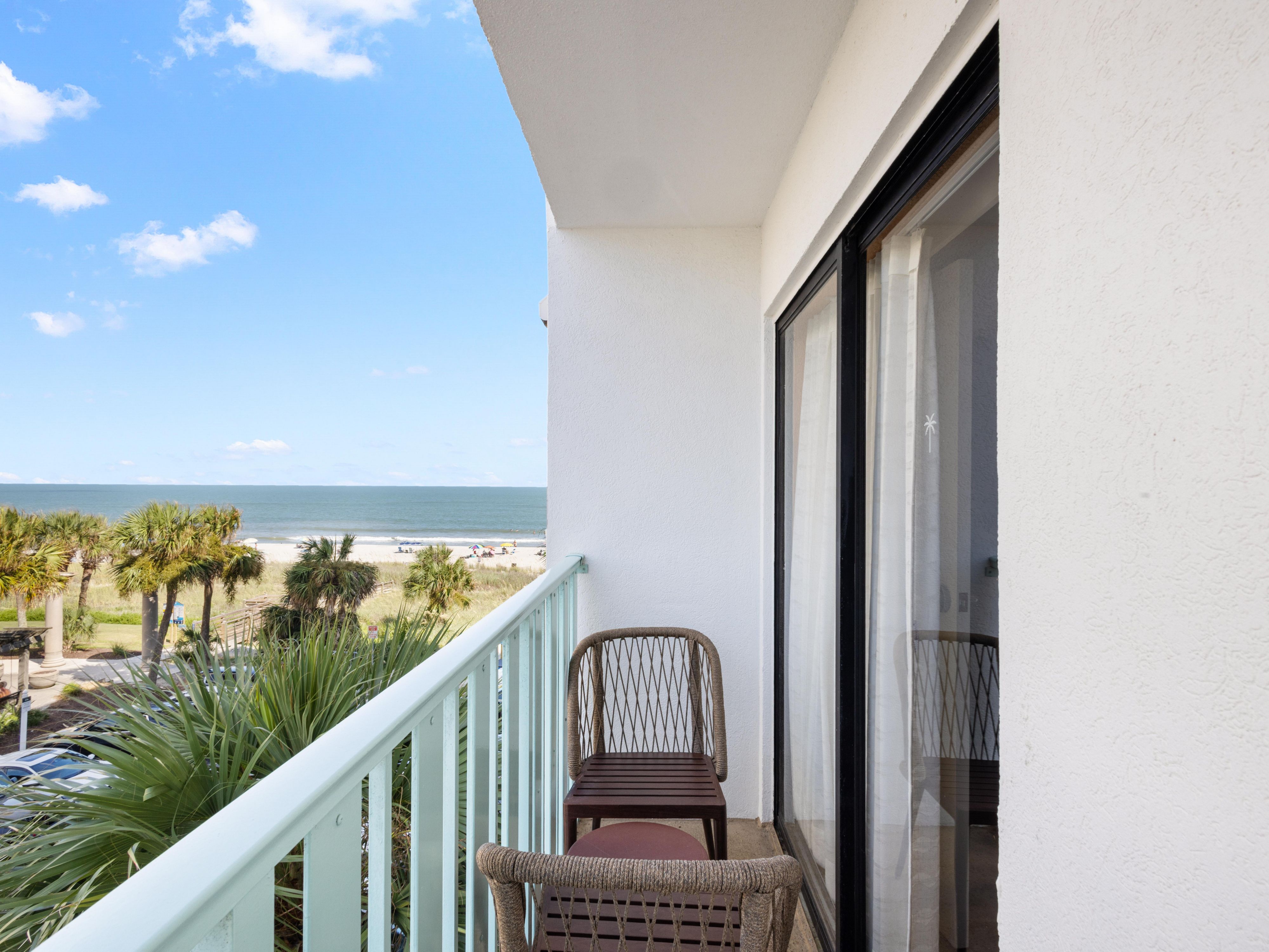 Enjoy ocean breezes and coastal views from your balcony seat.