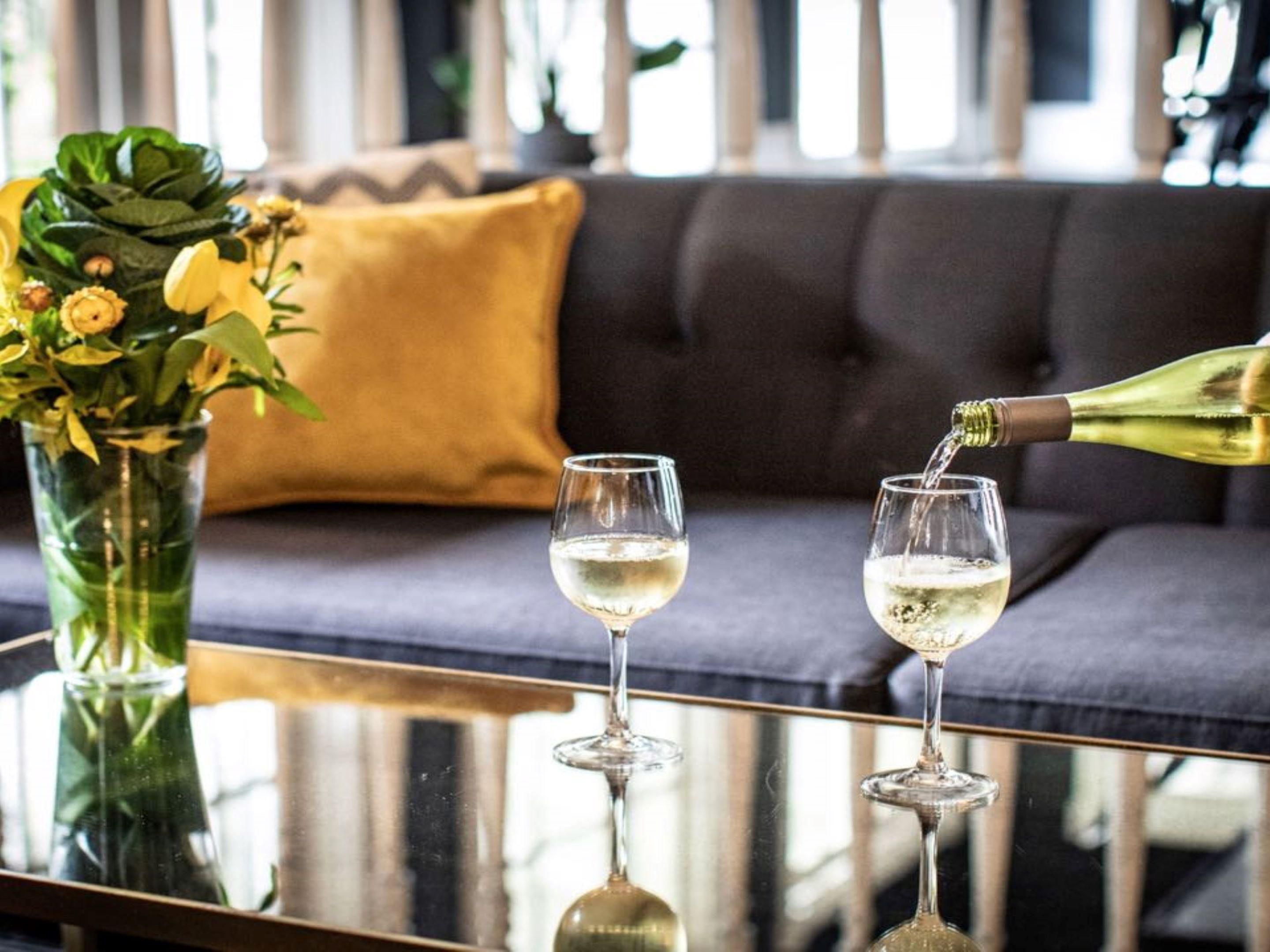 Wine being poured into glasses