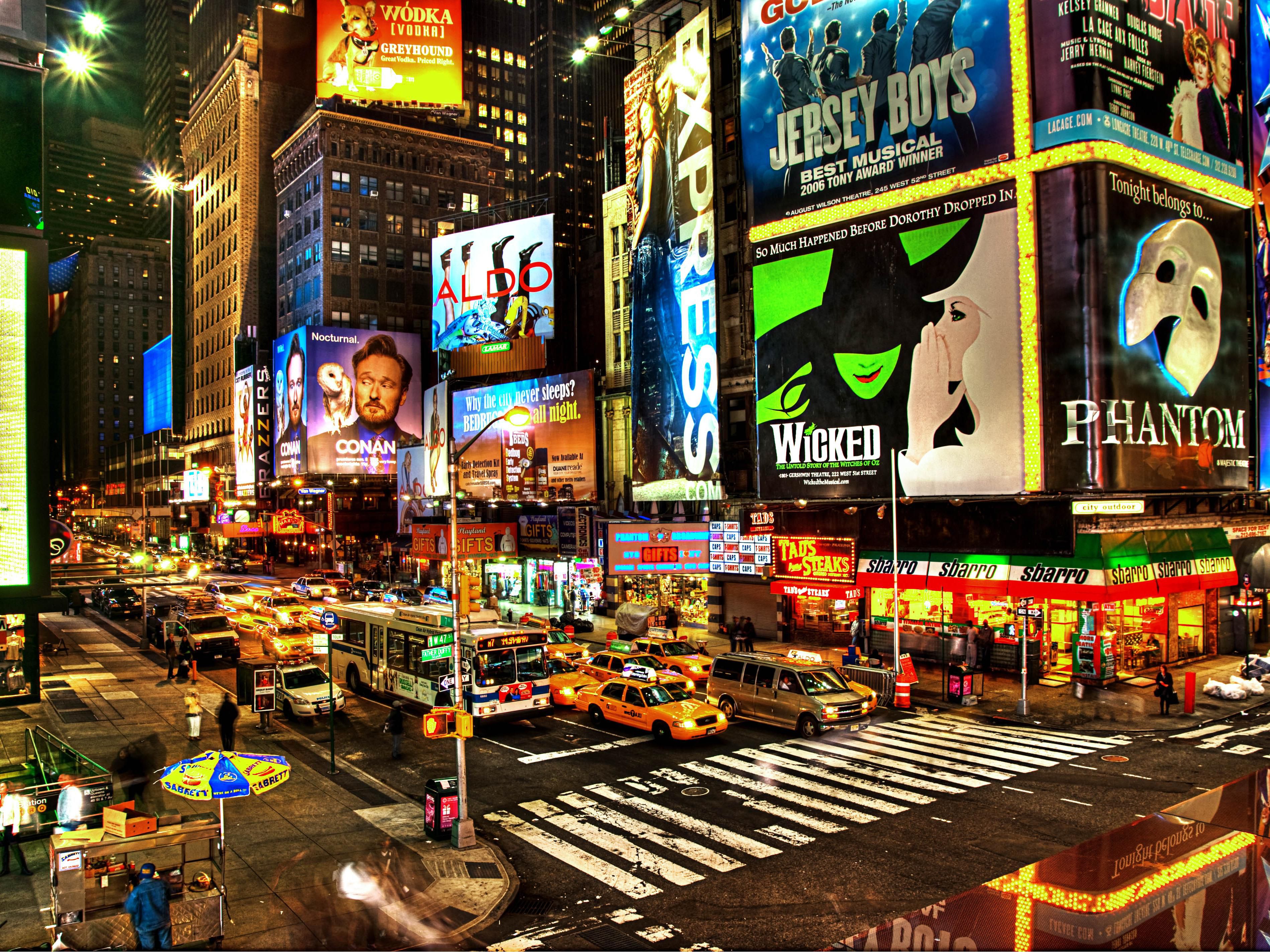Enjoy the neon lights of Broadway near our Times Square hotel.
