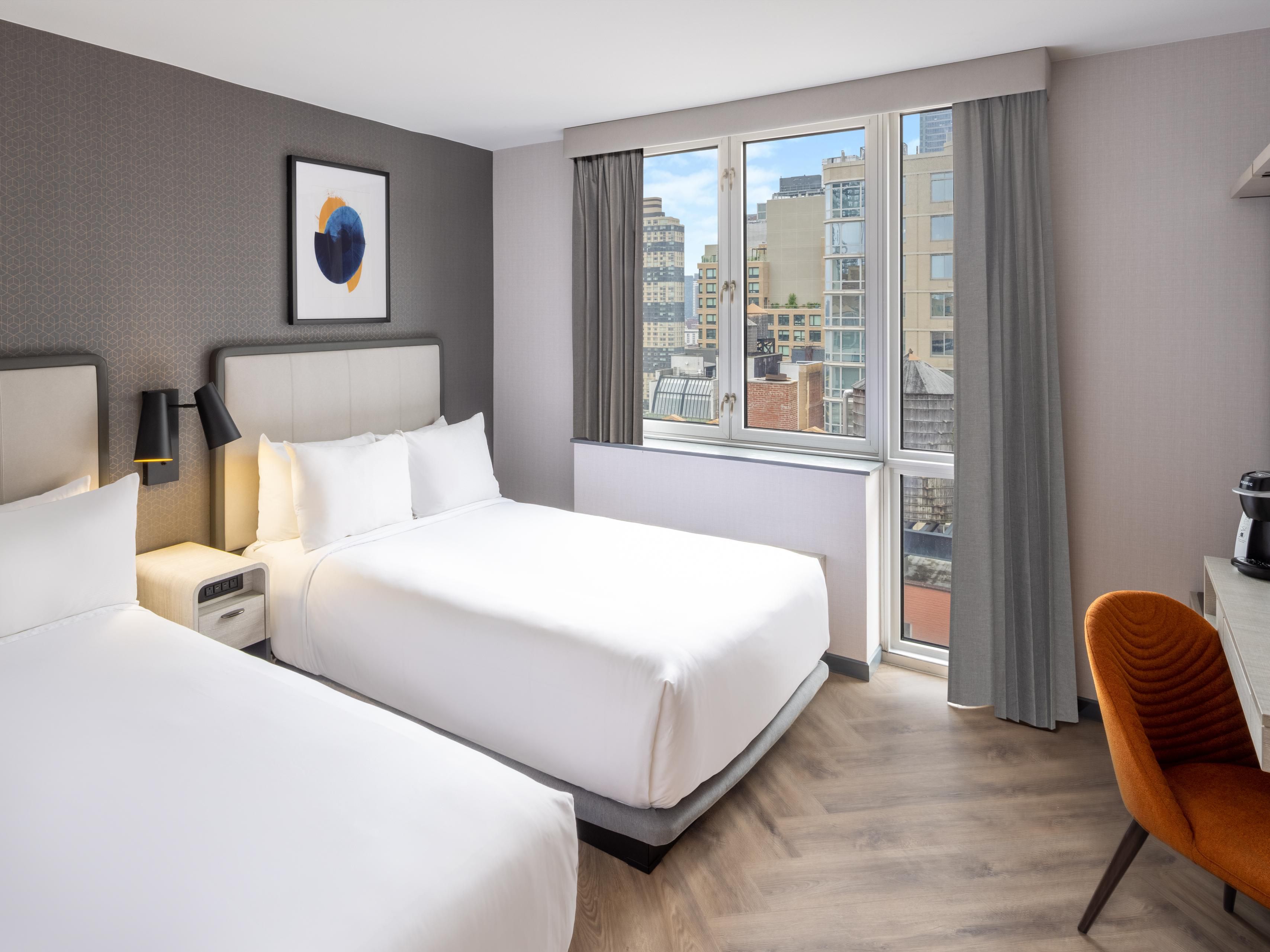 Relax in stylish, modern rooms at voco Times Square South, designed for comfort after a day exploring Midtown. Enjoy amenities tailored for both leisure and business travelers in vibrant Manhattan West.