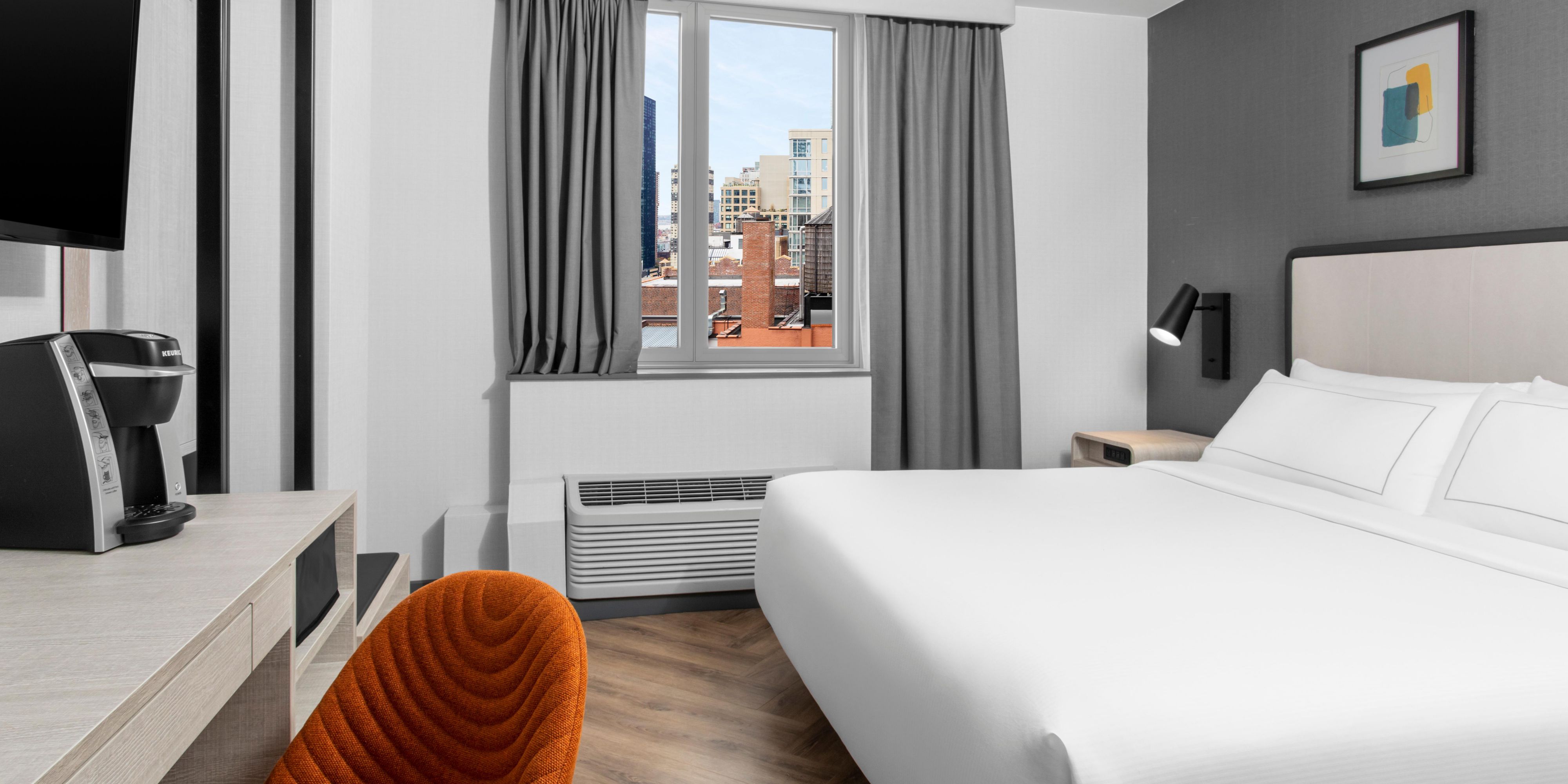 Make yourself at home in our guest rooms with a view of New York.