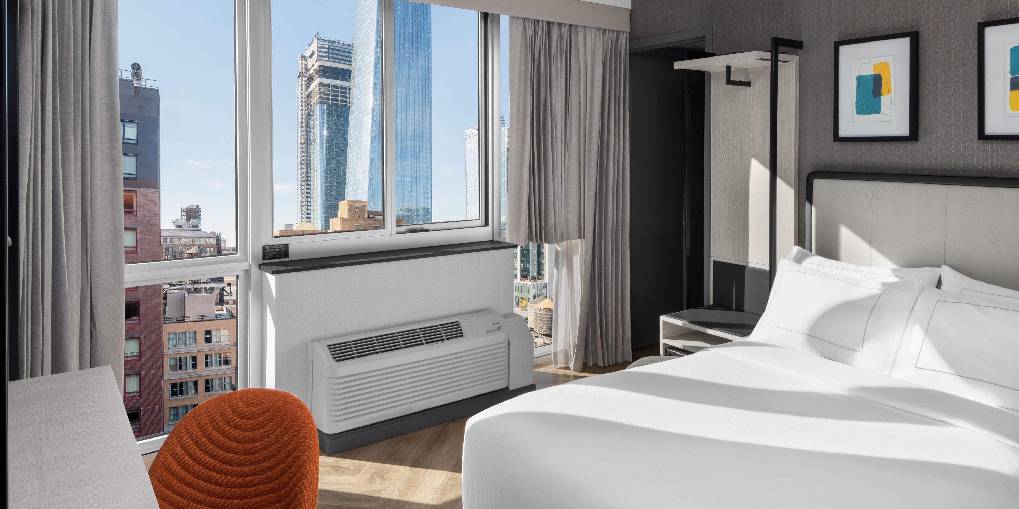 Unwind in style in our cozy West Midtown Manhattan rooms, featuring premium bedding, spa-inspired showers, and thoughtful touches like Keurig coffeemakers, strategic data ports, and free Wi-Fi. Designed for the perfect blend of functionality and relaxation, our rooms offer a serene retreat right in the heart of NYC.