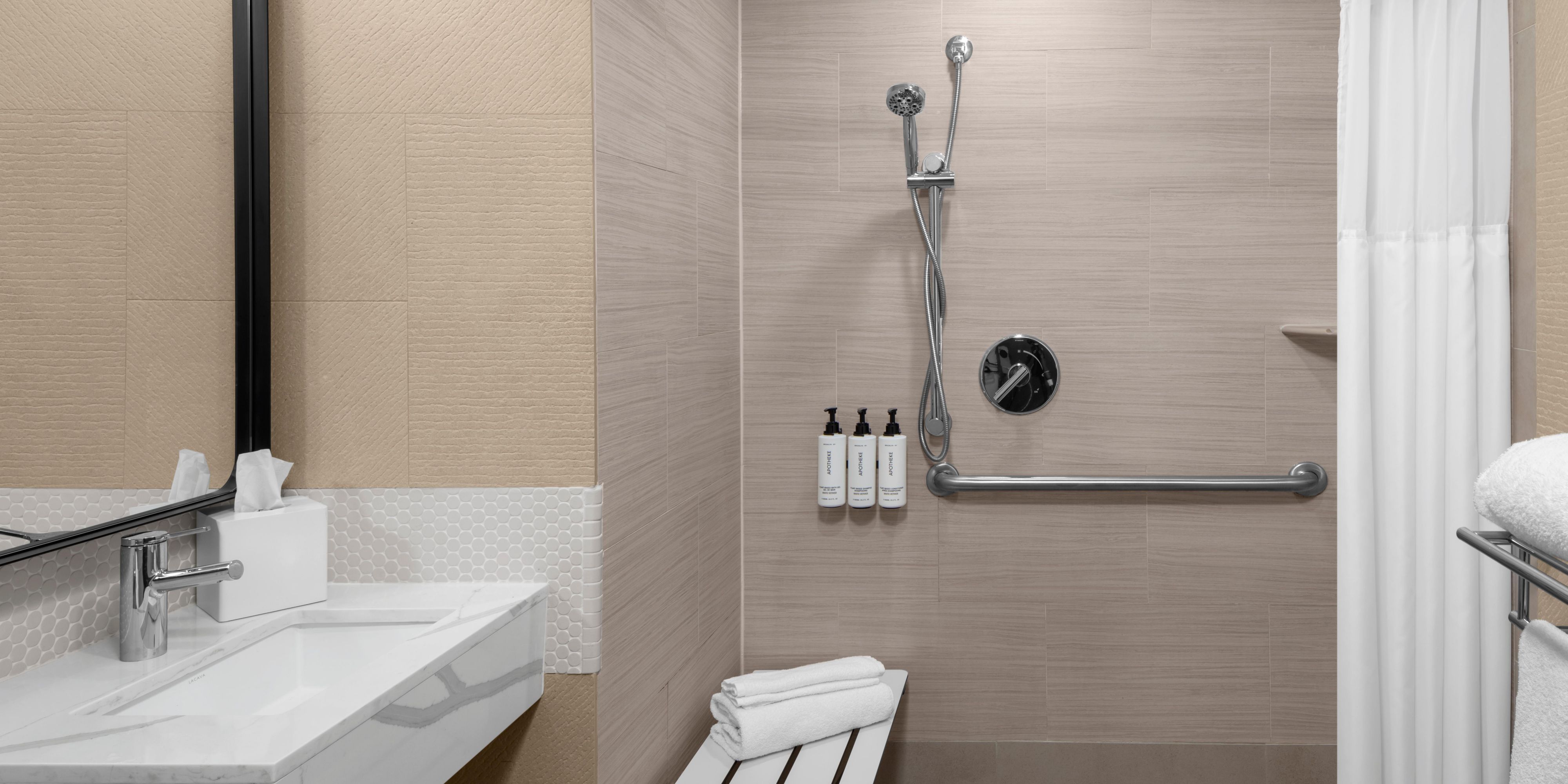 Accessibility features include roll-in shower.