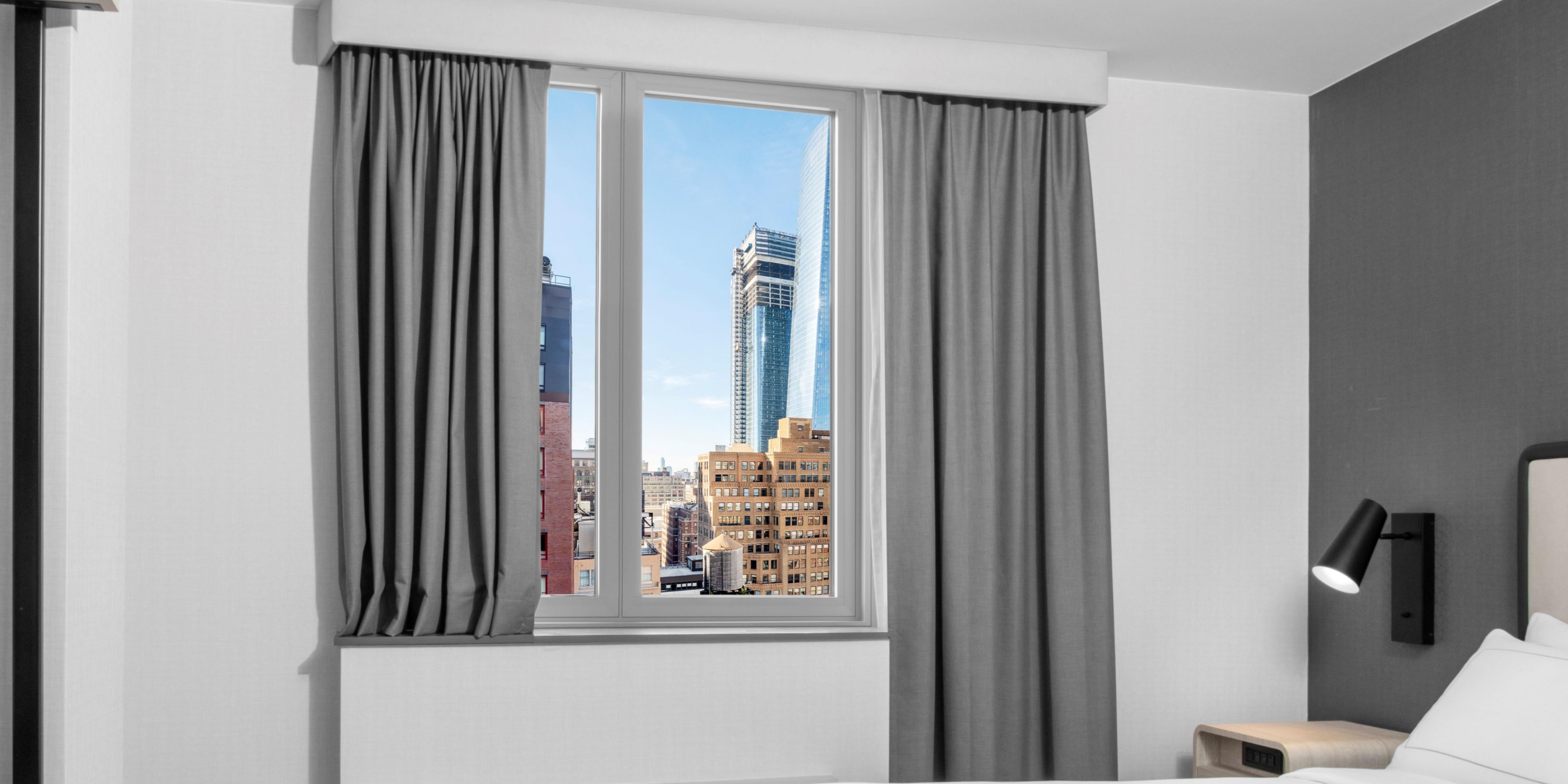 Premium guest rooms offer views of the Manhattan skyline.