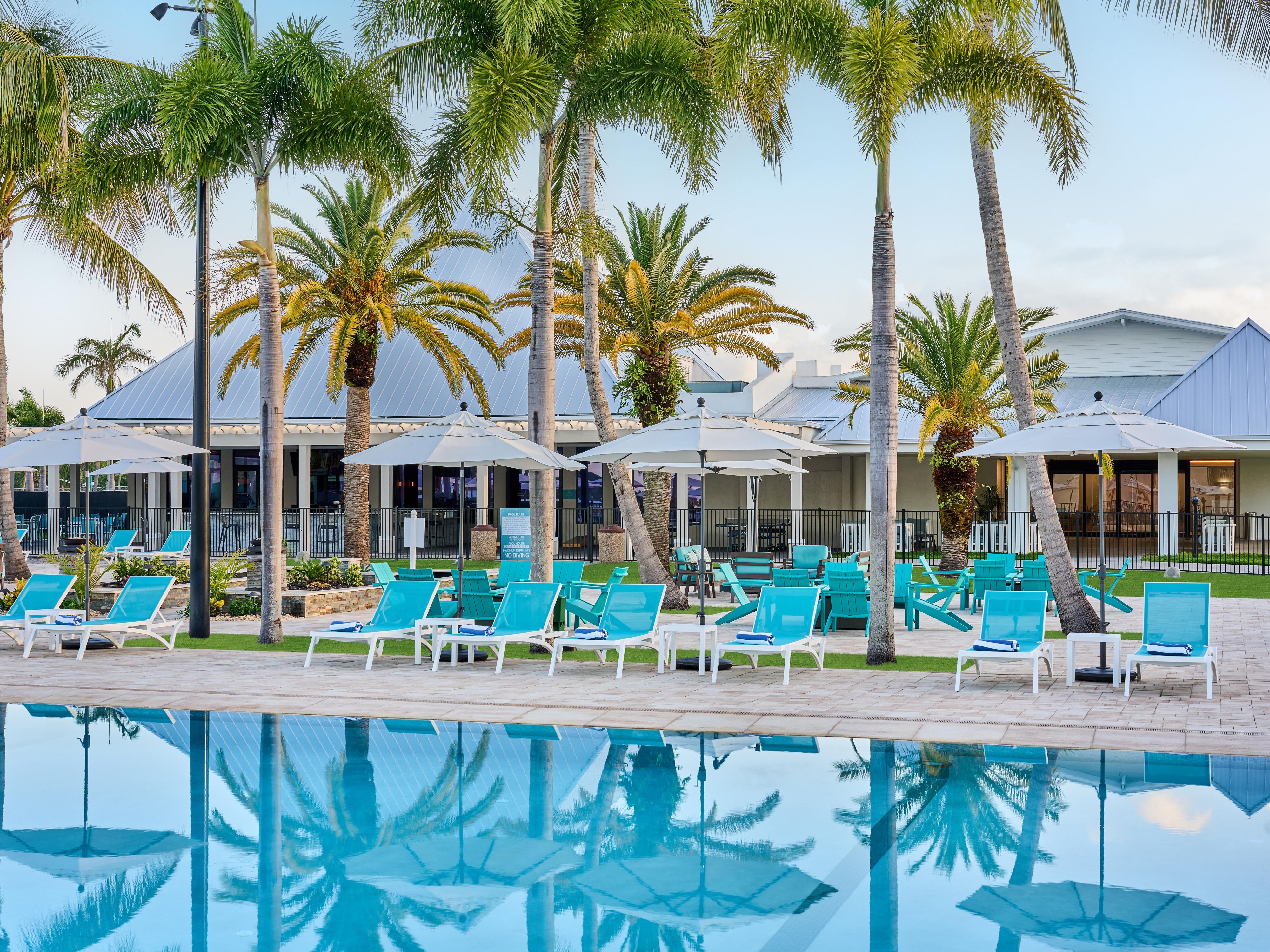 Sunshine, lounge chairs, and poolside drinks for perfect days