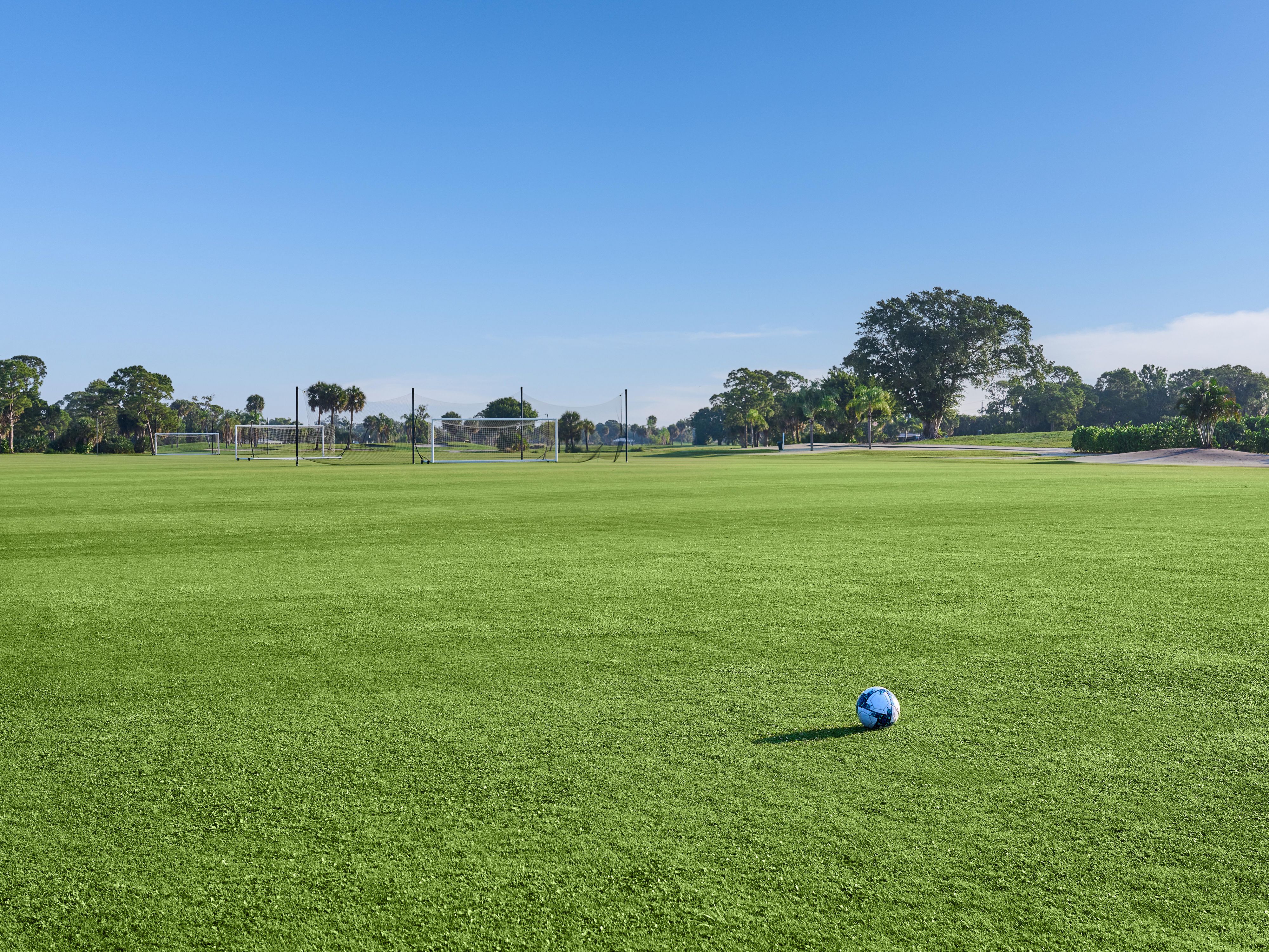 Kick back with a friendly match on our riverside soccer court