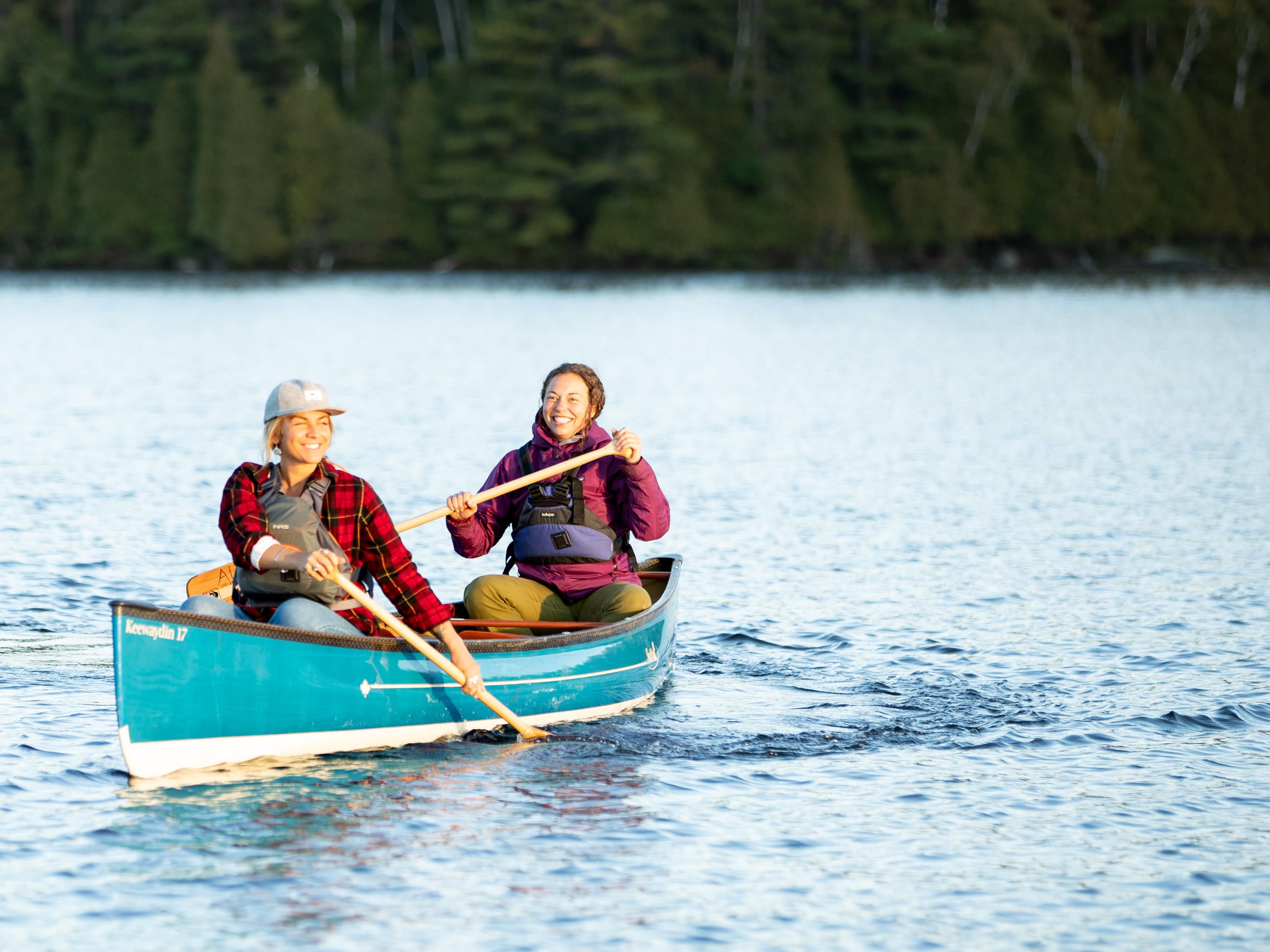Ladies in a canoe on lake
