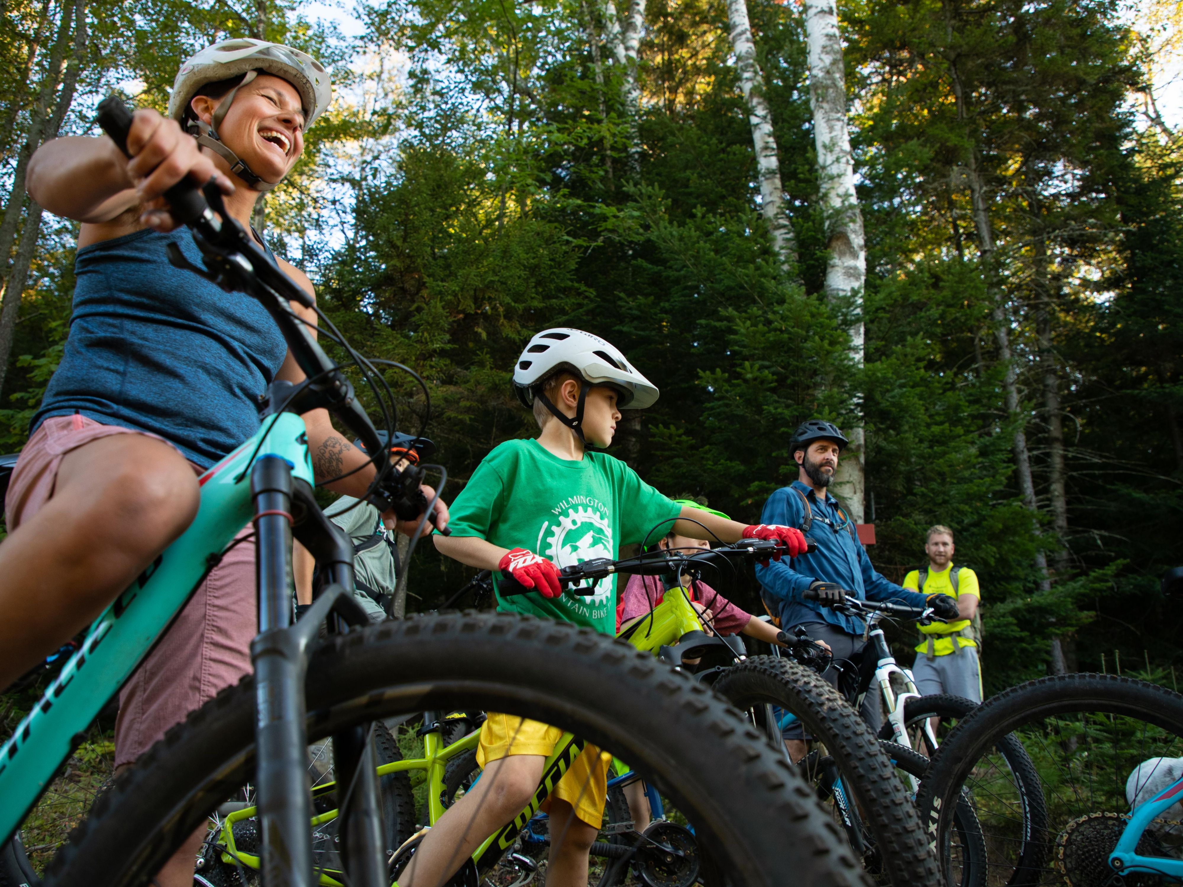 kids biking on a trail
