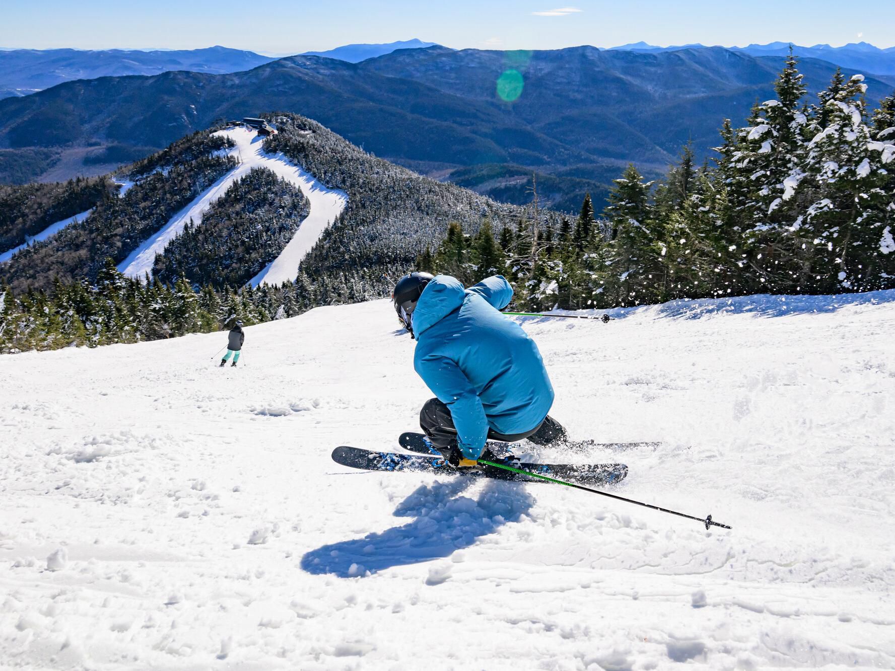 Guest skiing downhill