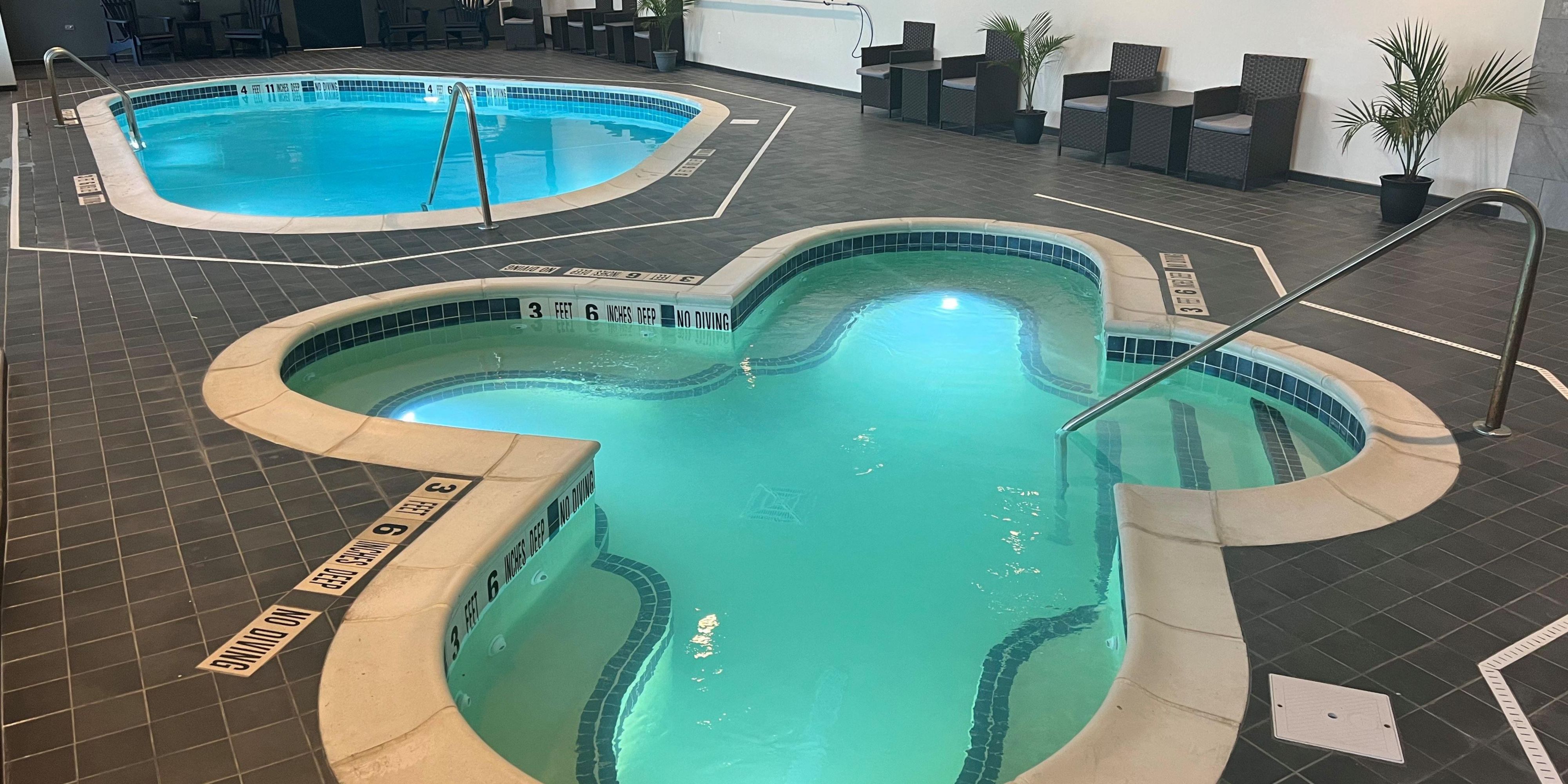 Relax and rejuvenate at our indoor pool and hot tub, open daily from 8:00am – 10:00pm for your year-round enjoyment. Whether you like to swim laps, make a splash, or unwind with a soothing soak in the hot tub, our indoor pool provides the perfect place for recreation and relaxation during your stay.