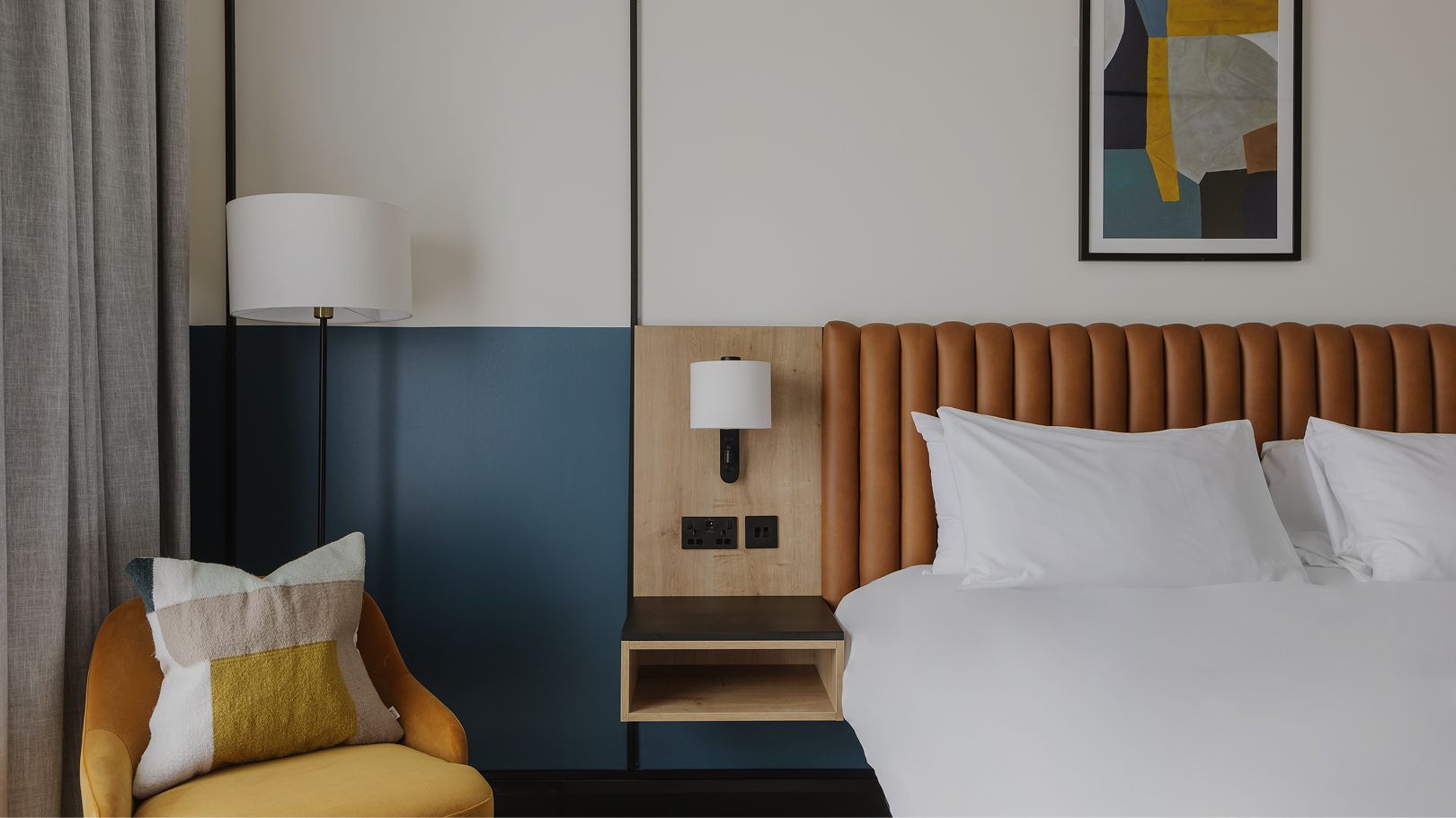 Room with yellow chair & bed
