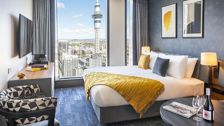 King bed room overlooking Auckland city and Sky Tower views