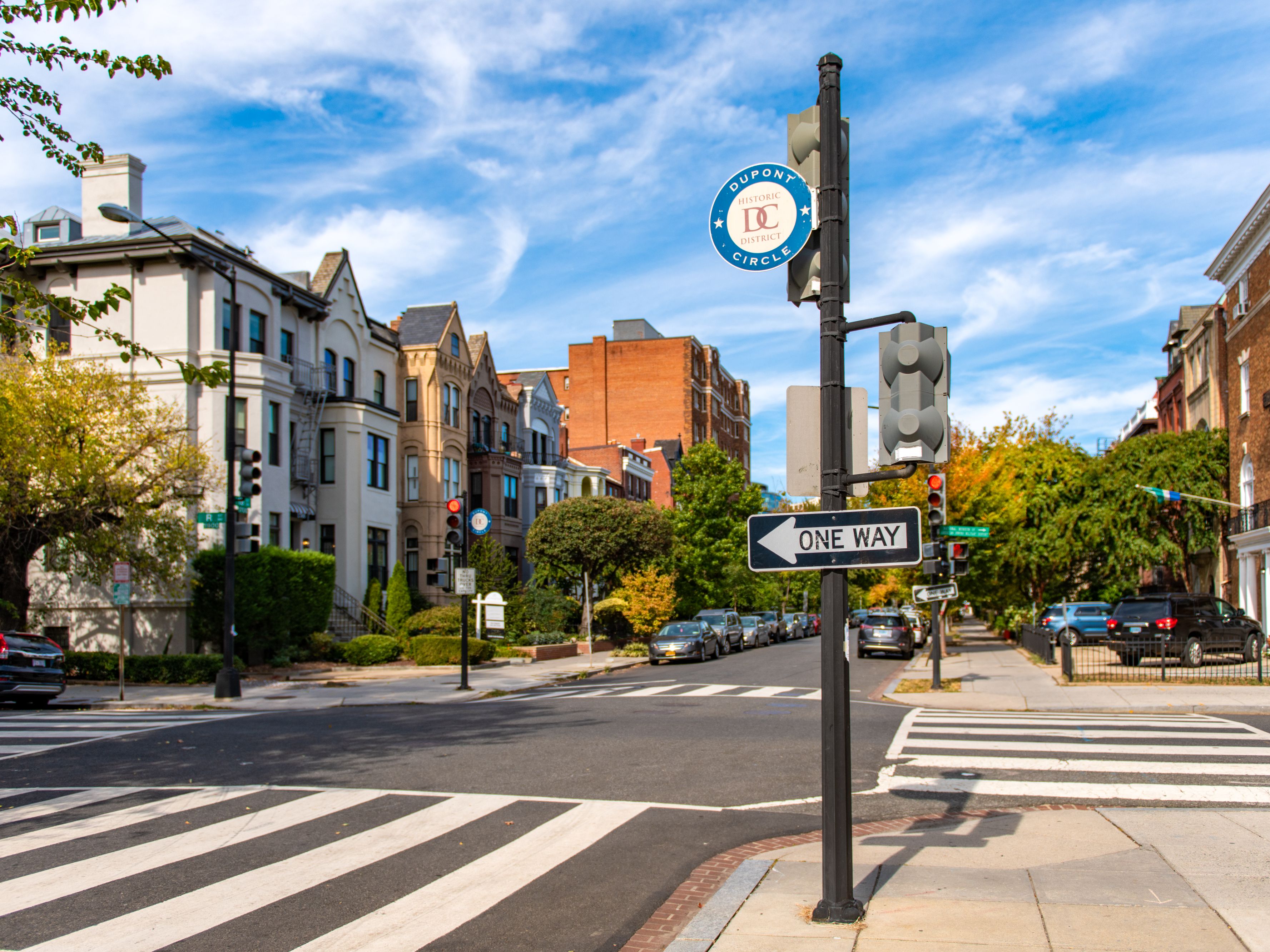 Dupont Circle, street lined with houses and buildings, in Washington D.C.