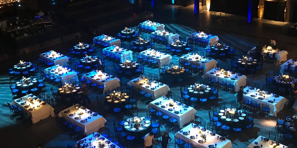 Gala tables and seating set up at The Anthem.