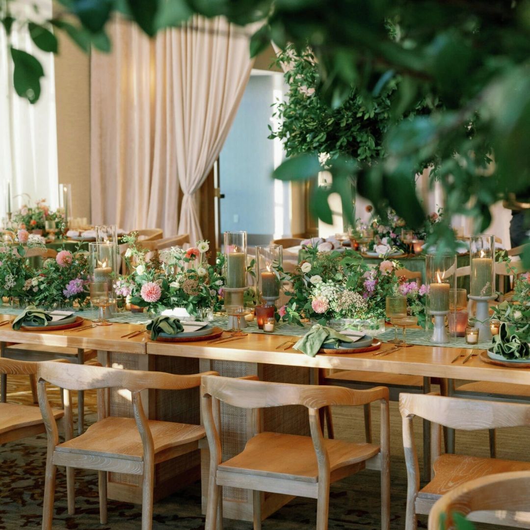 wedding reception table featuring colorful florals