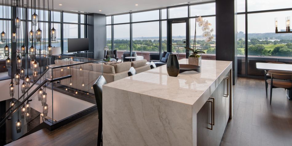 Presidential suite open concept kitchen and living room.