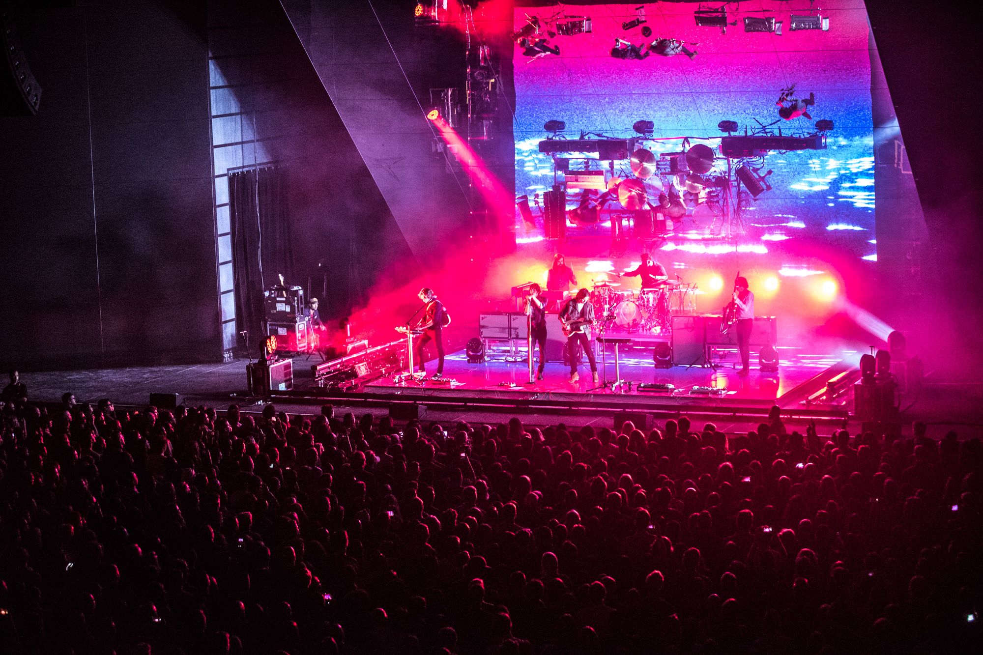 The band Phoenix performing live at The Anthem for a crowd.