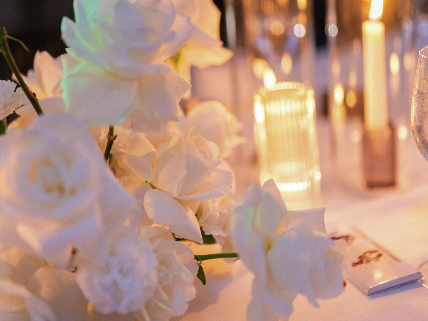 table set up with candles and flowers