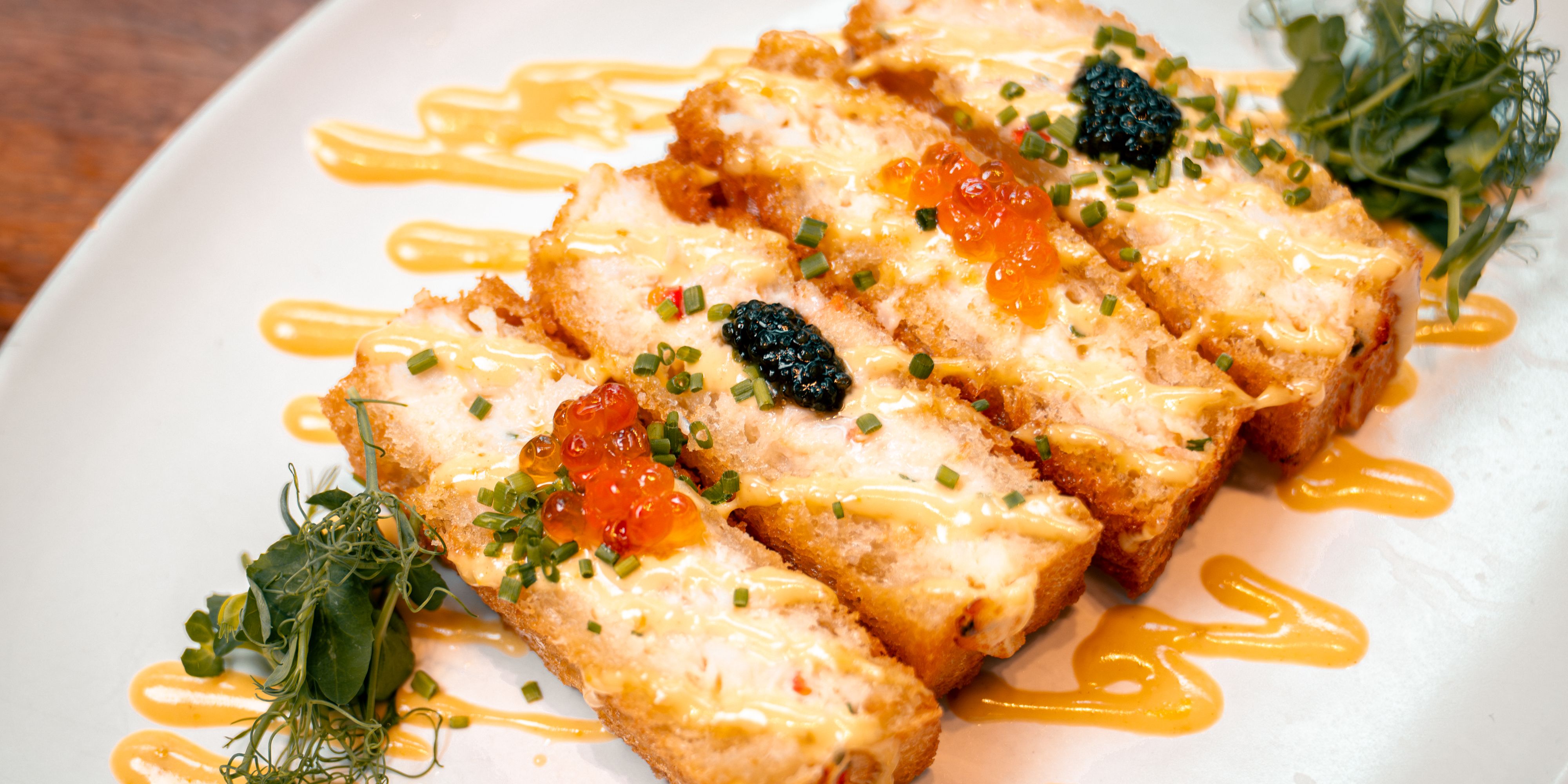 Milk bread with honey miso butter and salmon roe.