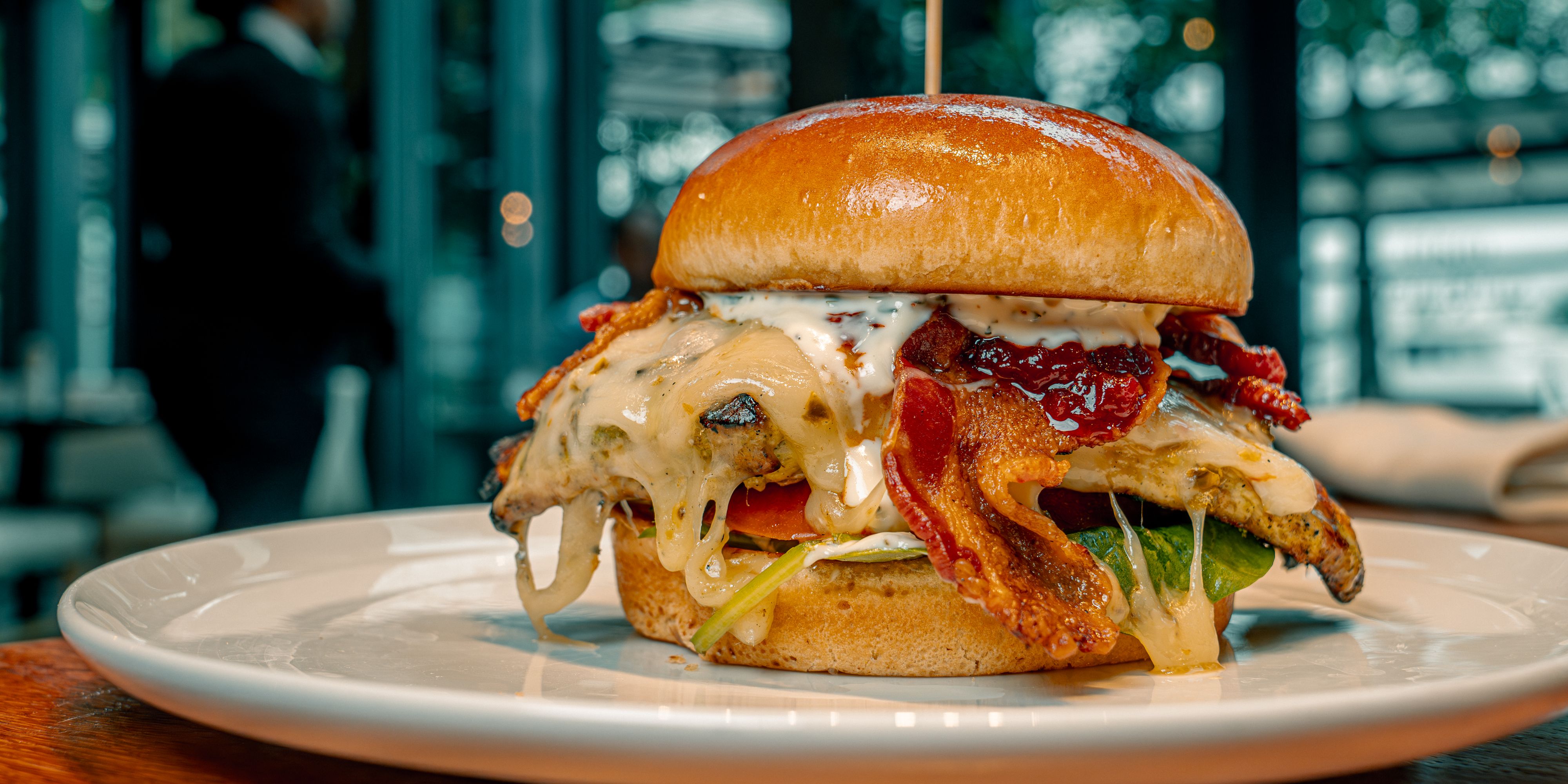 Spicy grilled chicken sandwich with pepper jack and chow chow.