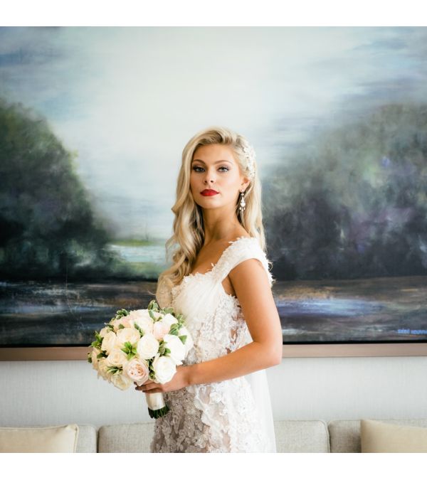 Bride holding flowers