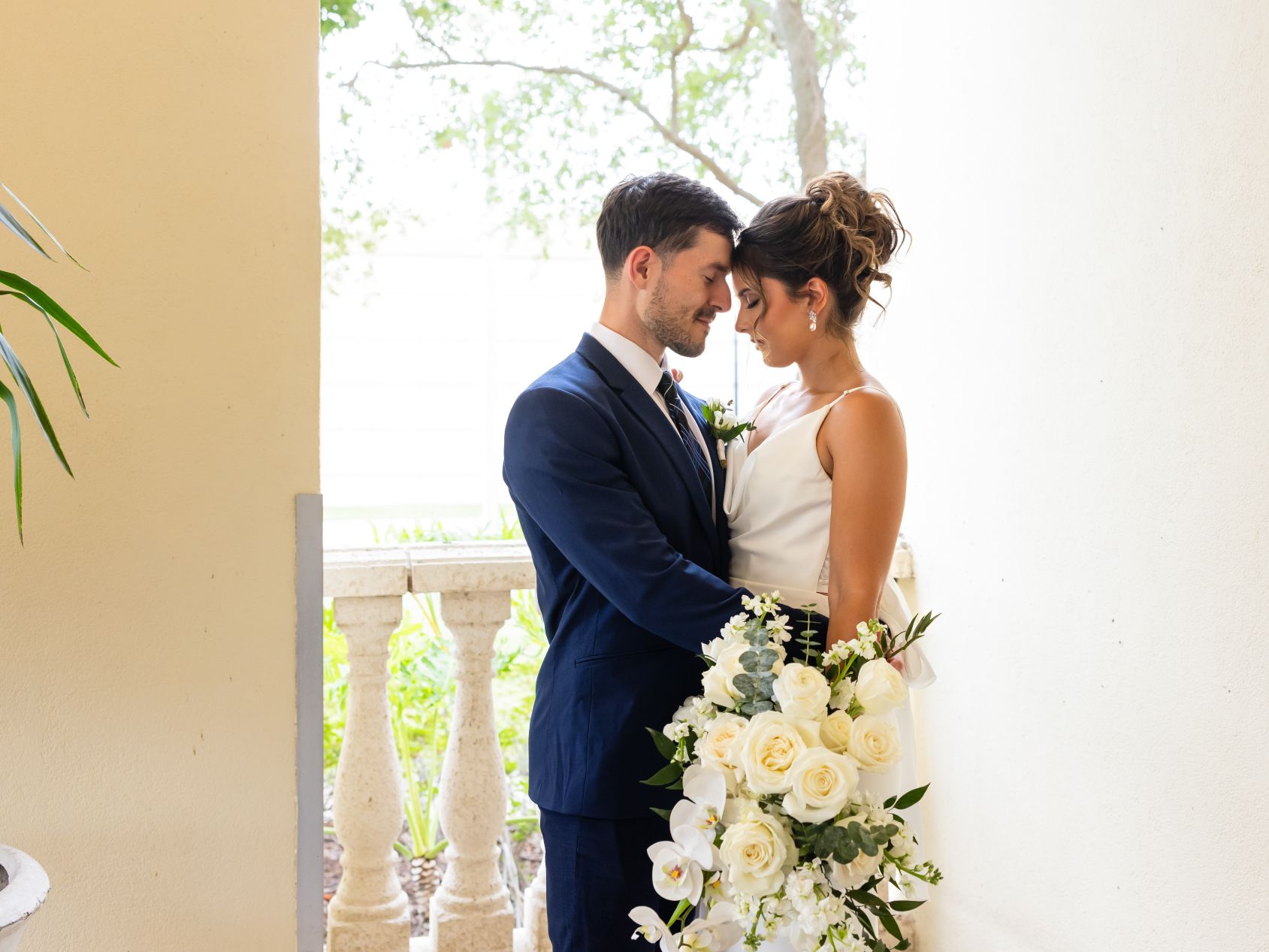 Couple embracing each other on wedding day