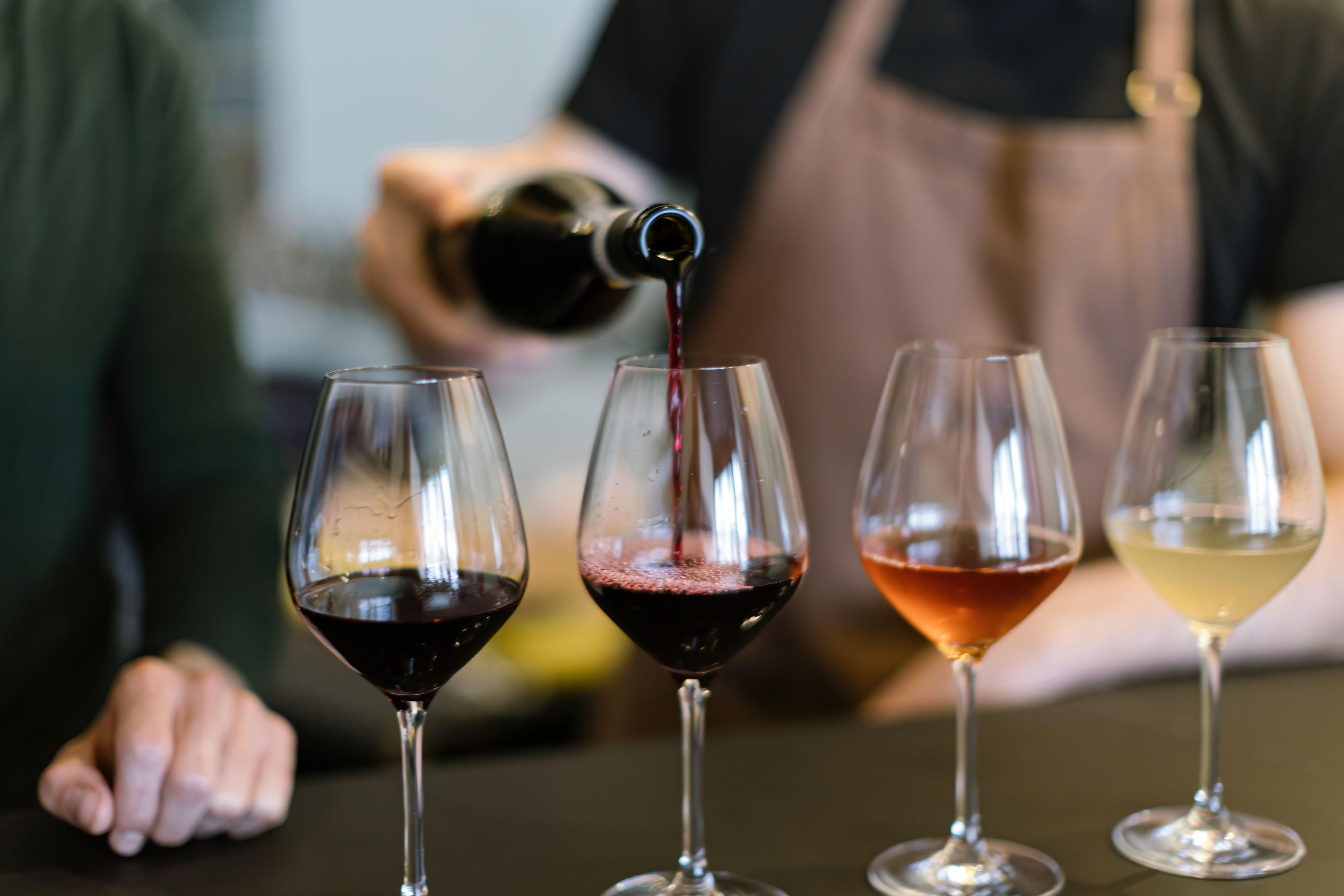 Wine flight with red and white wines.