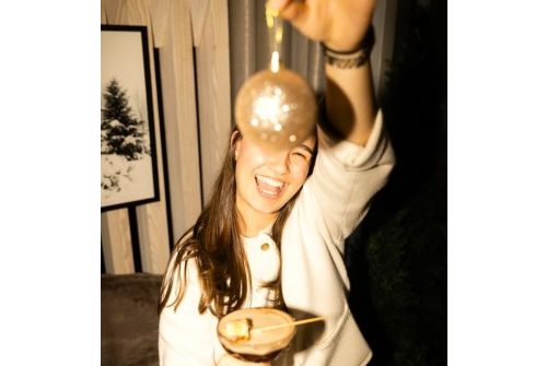 woman holding ornament