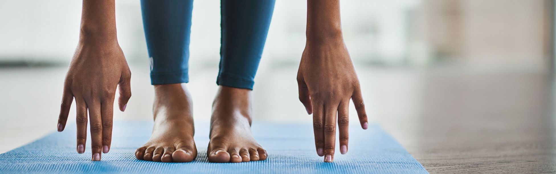 Individual participating in yoga exercises