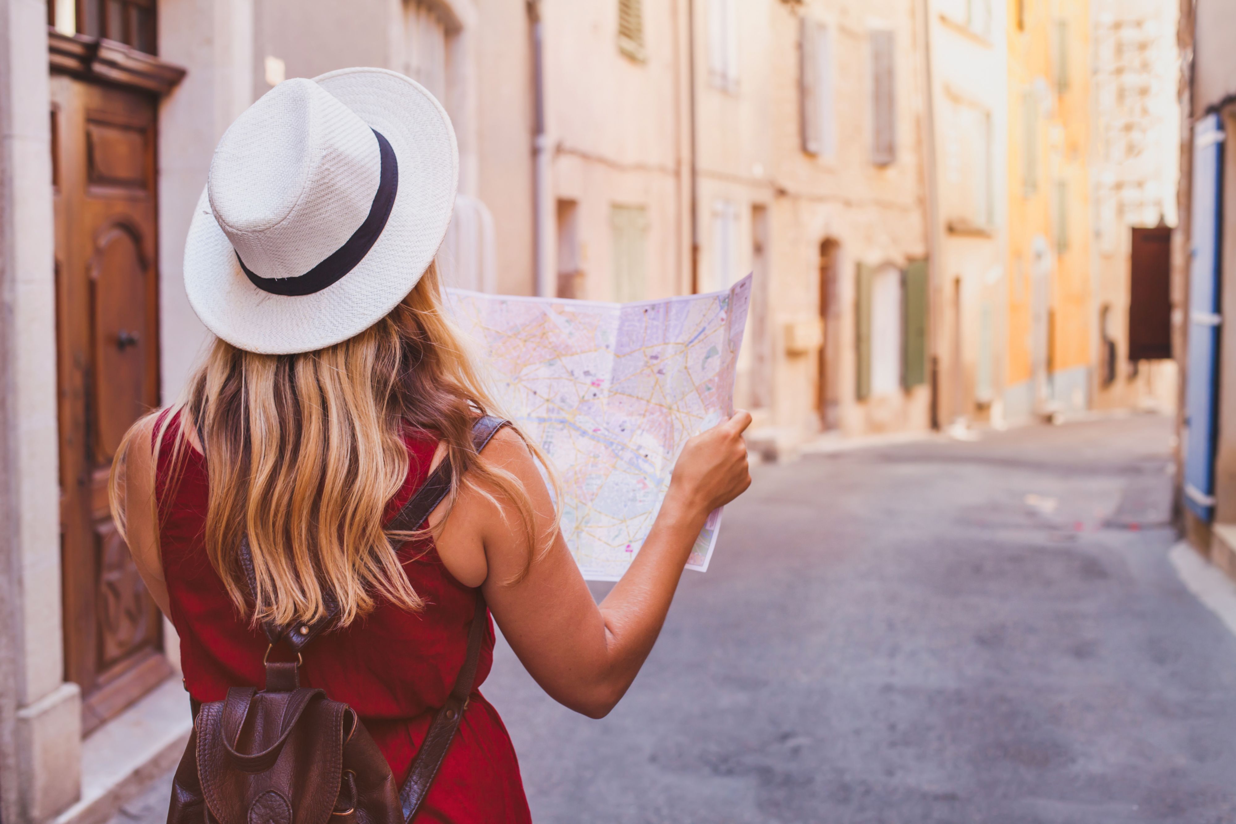 Tourist exploring the city with a map in hand